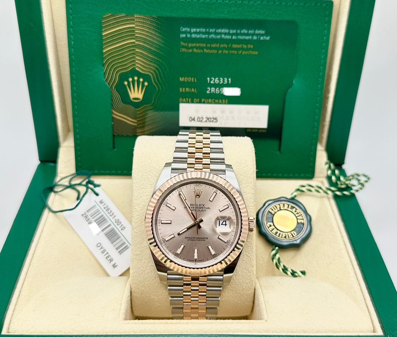 Style Number: 126331



Serial: 2R699***



Year: 2025

 

Model: Rolex Datejust 41

 

Case Material: Stainless Steel

 

Band: 18K Rose Gold & Stainless Steel

  

Bezel: 18K Rose Gold Fluted

  

Dial: Sundust Pink

 

Crystal: Sapphire Crystal

