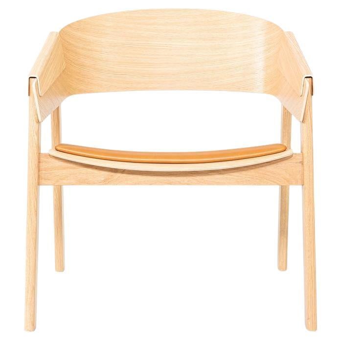 2025 Thomas Bentzen per Muuto Cover Lounge Chair con seduta in pelle