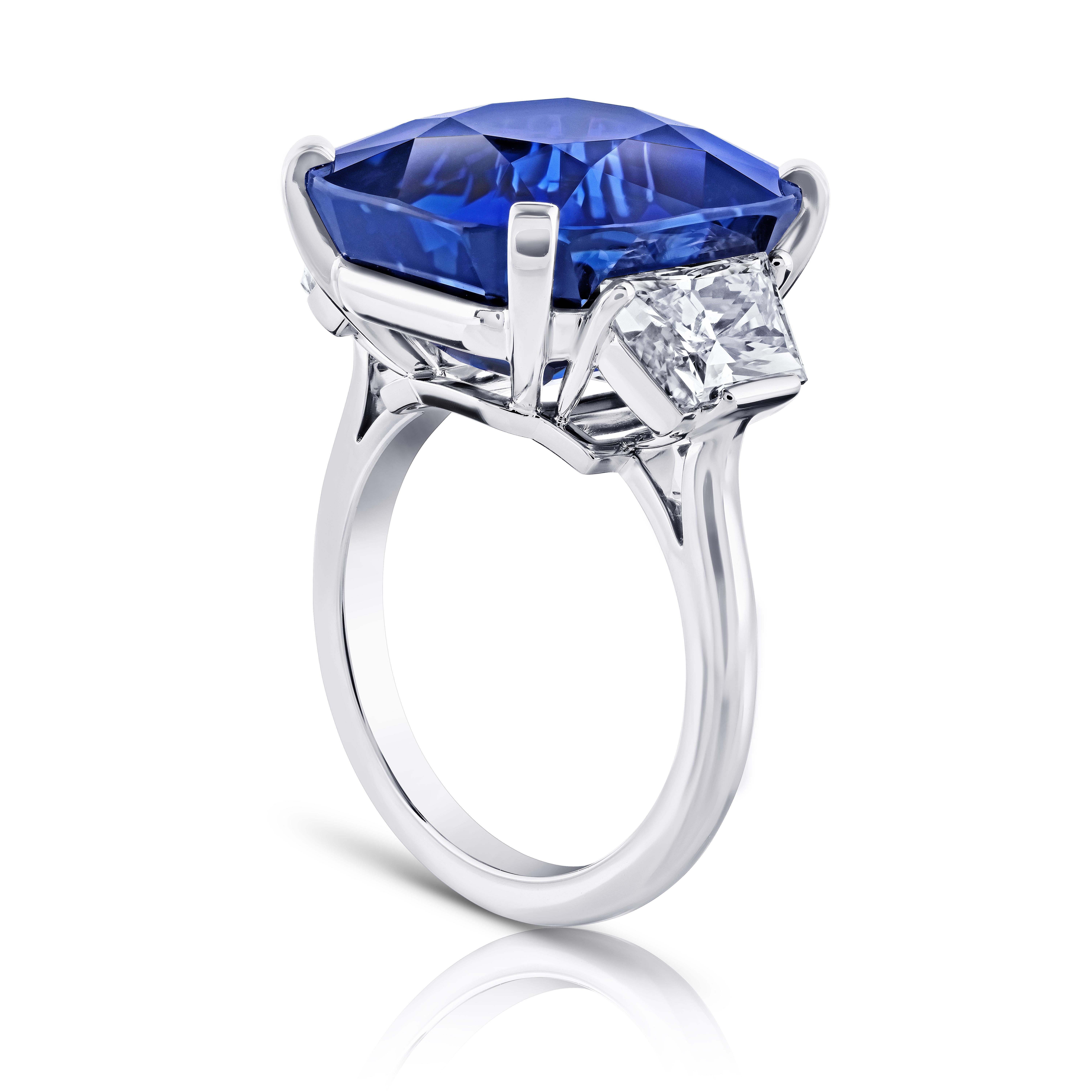 20.26 carat Cushion Blue Sapphire with two Trapezoid Modified Brilliant Diamonds 2.41 carats set in a handmade Platinum ring