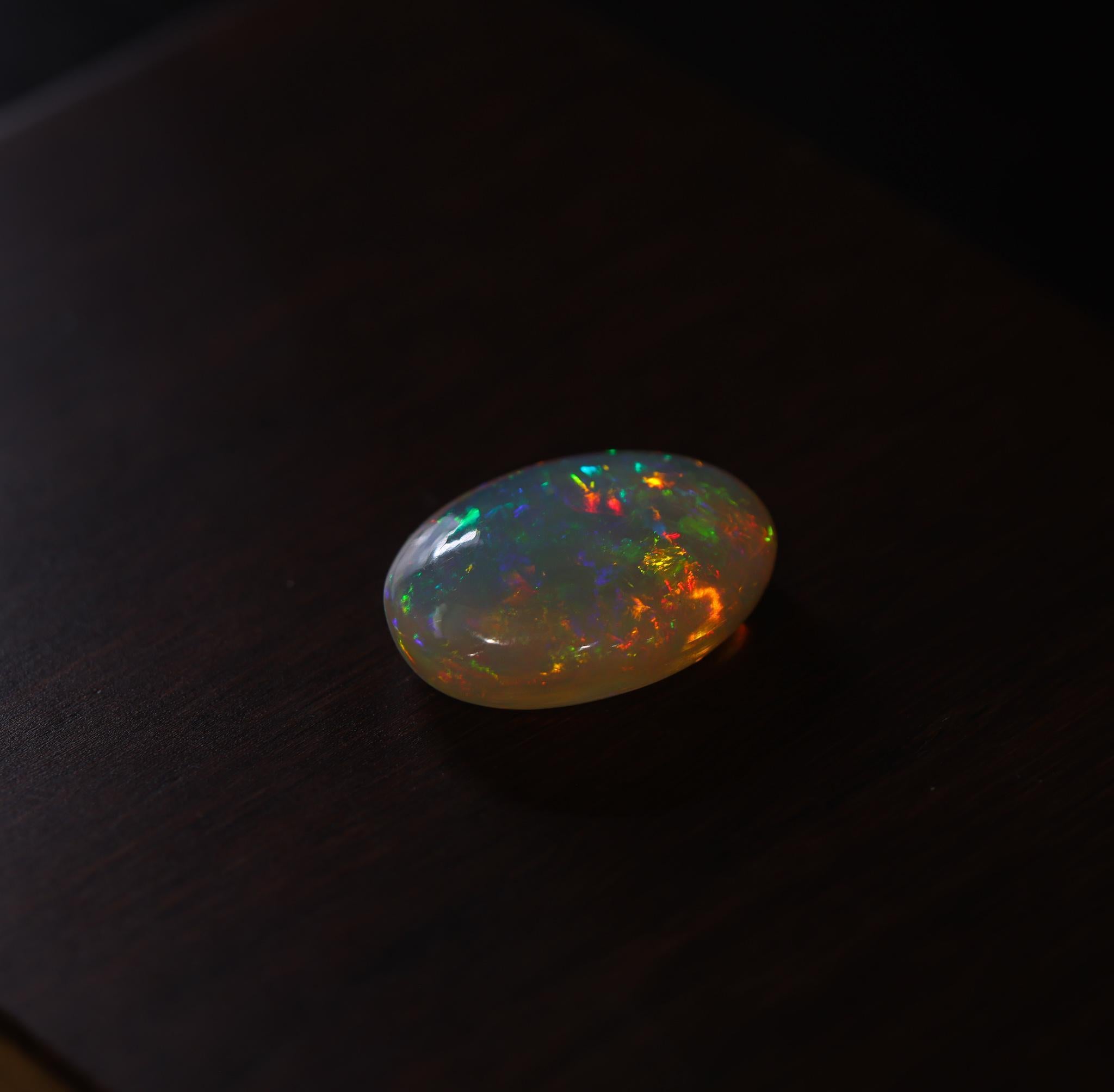 20,27 Karat Äthiopischer Opal Loser Edelstein  Oval 24x17mm (Cabochon) im Angebot