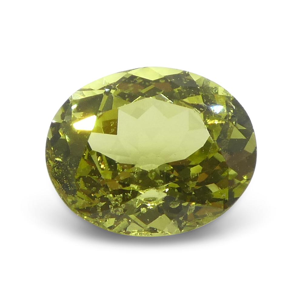 Women's or Men's 2.02ct Oval Green-Yellow Chrysoberyl from Brazil For Sale