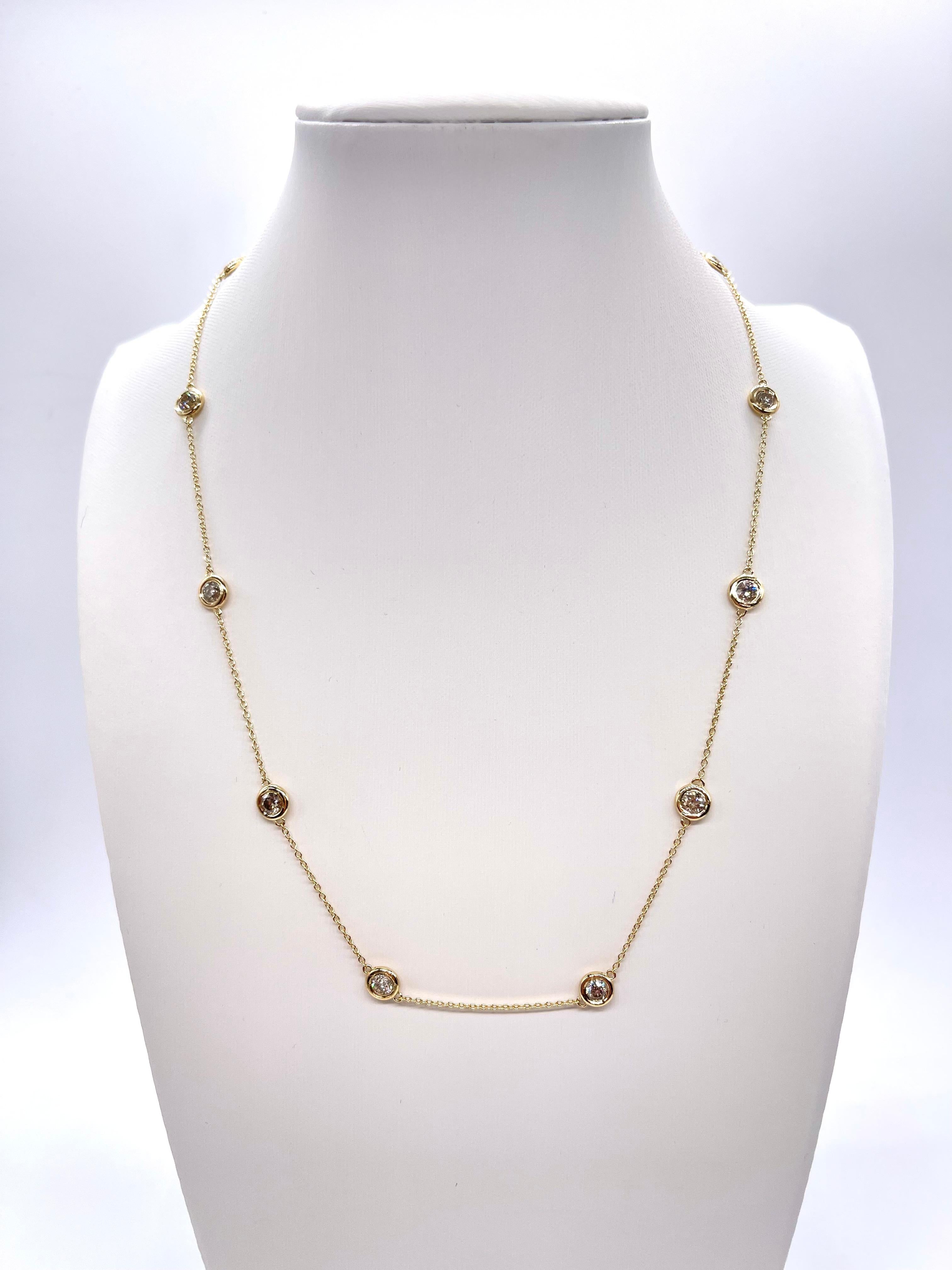 10 Station Diamond by the yard necklace set in Italian made 14K yellow gold. 
Total weight is 2.03 carats. Beautiful shiny stones. 
Length 16 inch 5.29 grams. Average K-,SI Natural Diamond

*Free shipping within U.S*