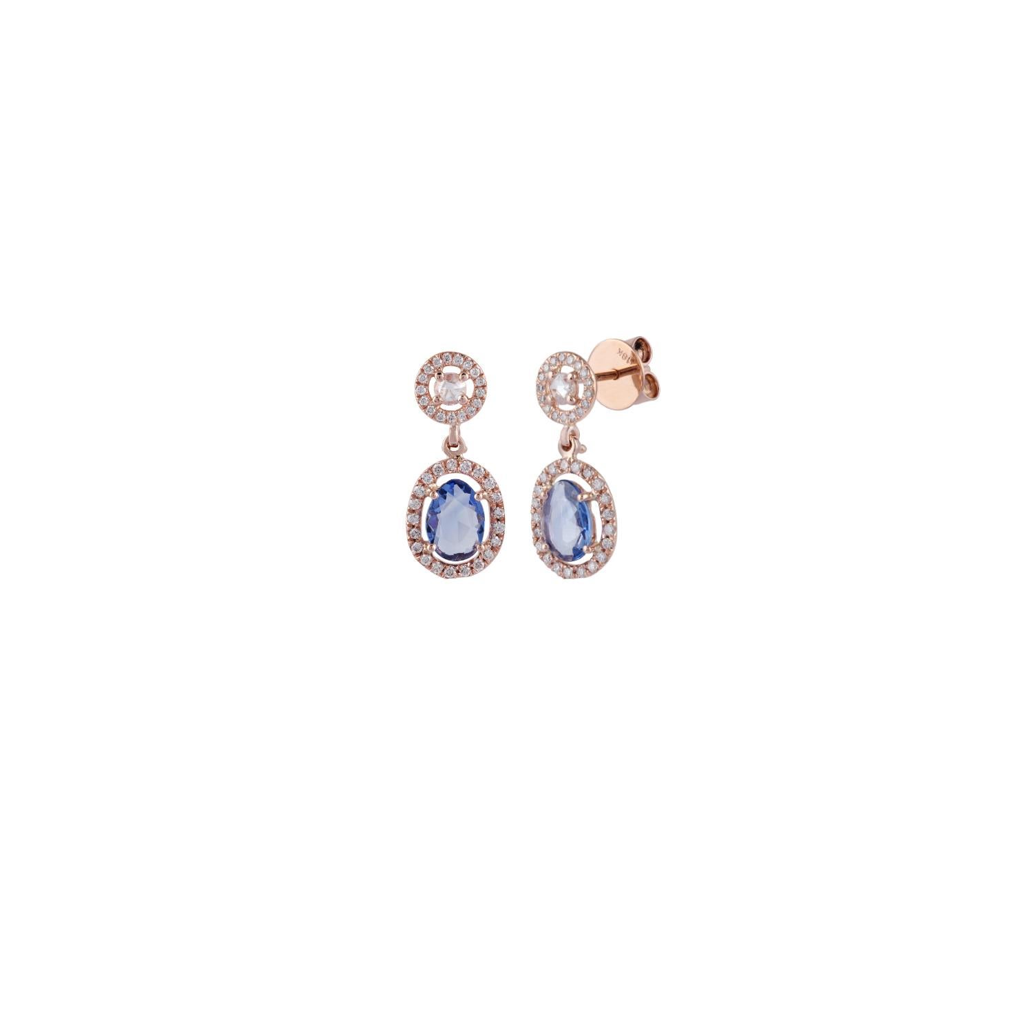 An exclusive pair of earrings with rose cut blue sapphire 2.03 carat, rose-cut diamond 0.10 carat & in the cluster with a round-shaped diamond 0.41 carat studded in 18K rose gold 3.27 grams with a simple pull-push mechanism. These are elegant &