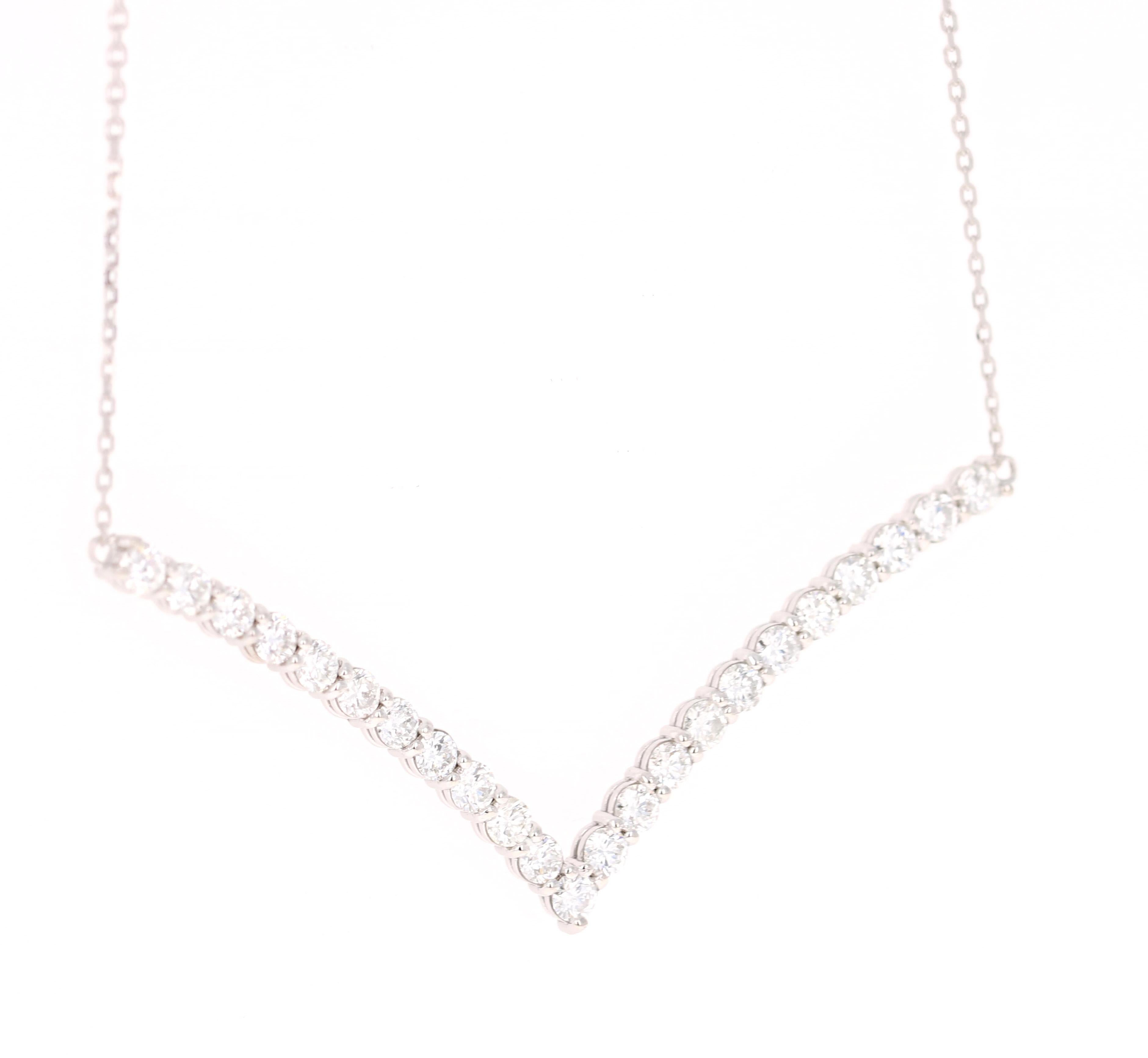 
 This Chain Necklace has a V-Shaped Necklace that has 23 Round Cut Diamonds (Clarity: SI, Color: F) that weigh 2.03 Carats. The Clarity and Color of the diamonds are SI-F. 

It is beautifully curated in 14 Karat White Gold and weighs 3.2 grams. The