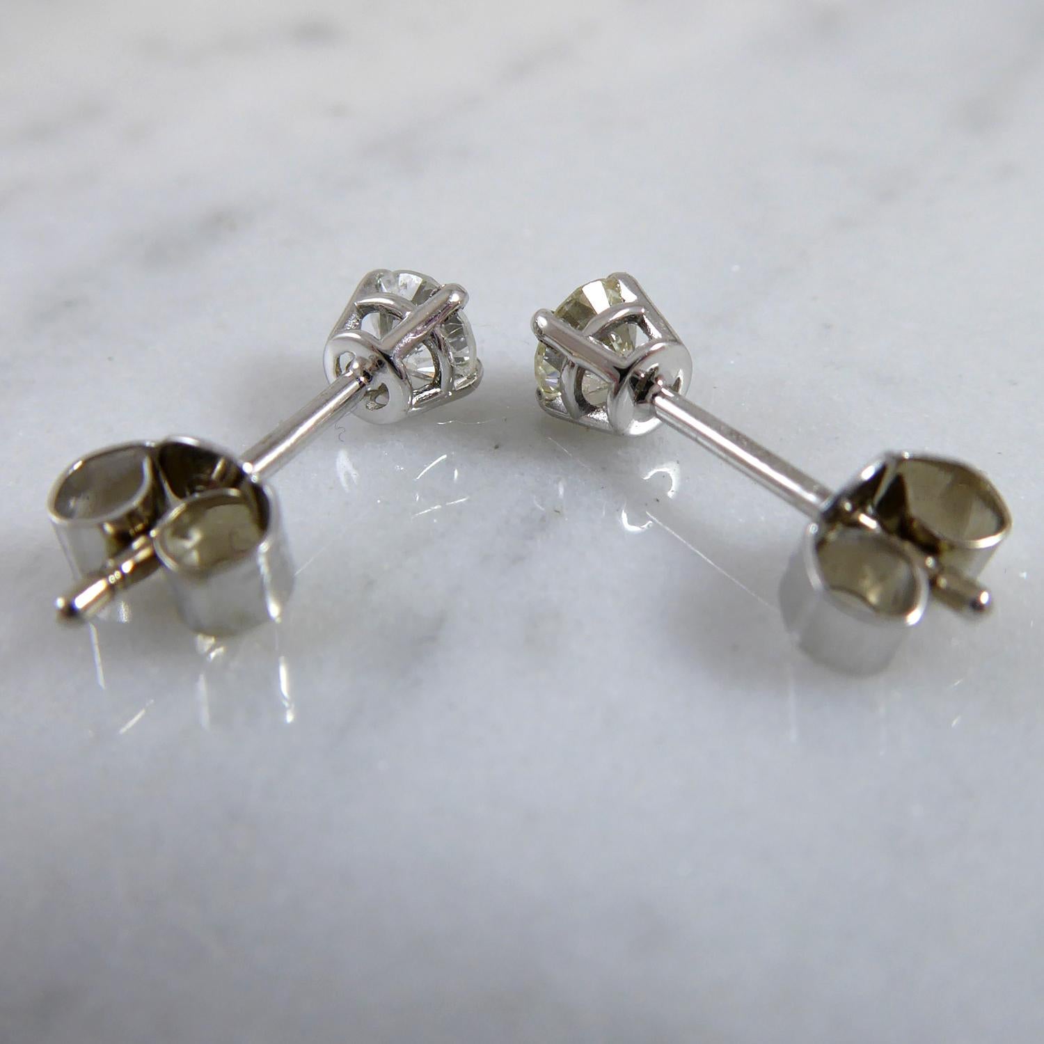 Round Cut 2.03 Carat Diamond Solitaire Earrings, Platinum