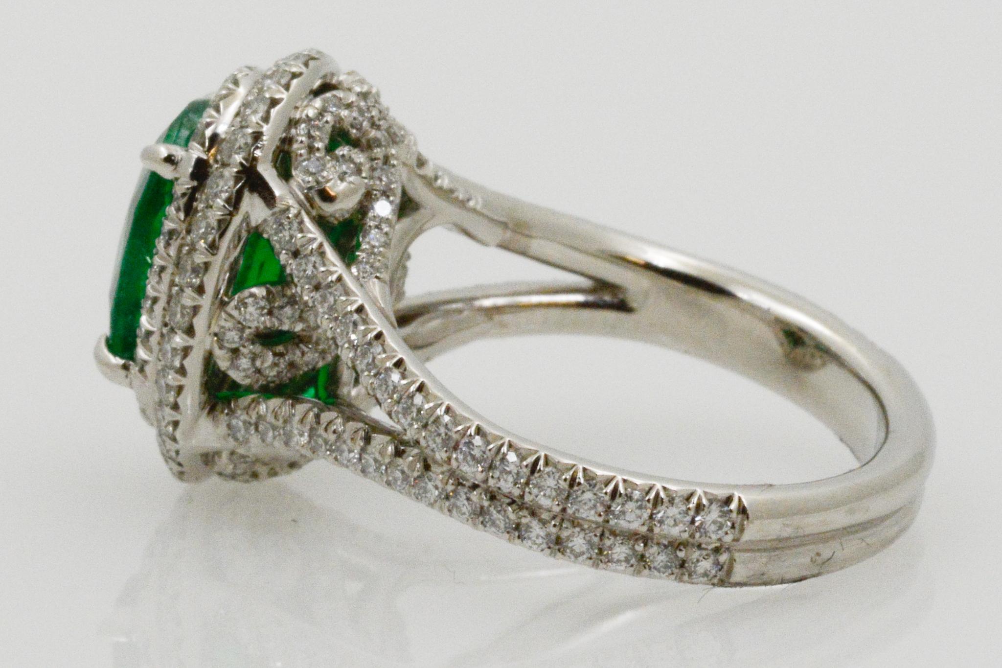 Women's 2.03 Carat Emerald and Diamond Halo Platinum Ring