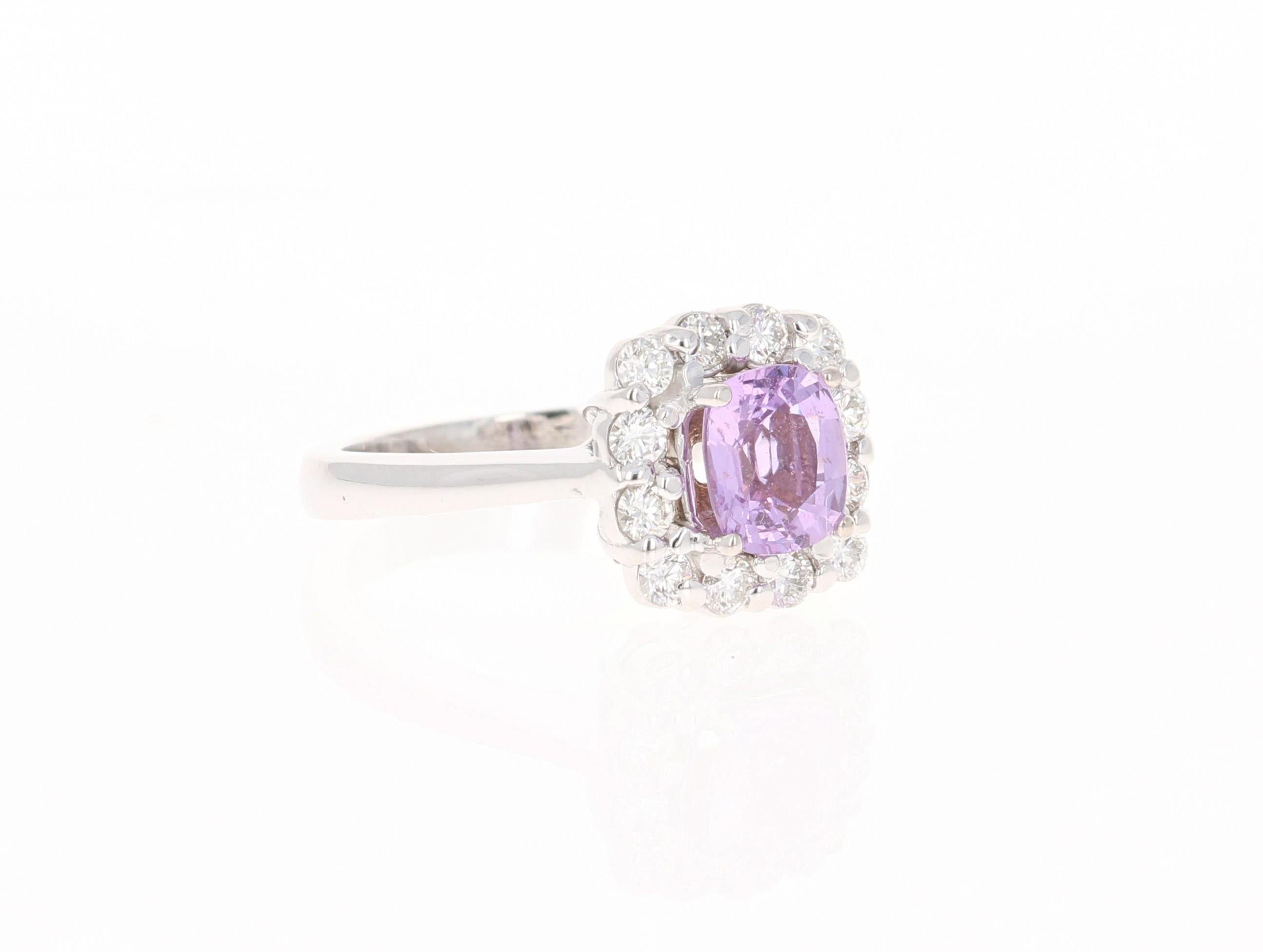 This ring has a Cushion Cut Pink Sapphire that weighs 1.49 carats. It also has 12 Round Cut Diamonds that surround the ring that weighs 0.54 carats. (Clarity: VS, Color: F) The GIA Certificate # is: 6224046214. You can see a copy of the certificate