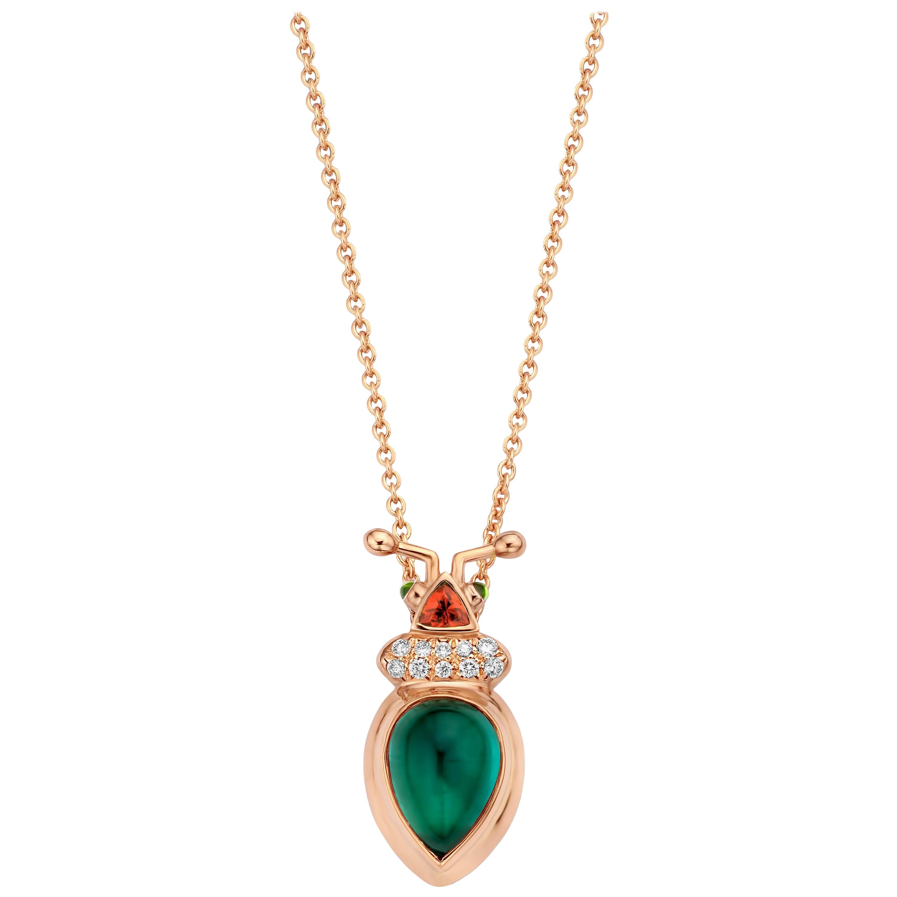 One of a kind lucky beetle necklace in 18K rose gold 10g set with the finest diamonds in brilliant cut 0,09Ct (VVS/DEF quality) and one natural, green tourmaline in pear cabochon cut 2,03Ct. The head is set with a tsavorite in trillion cut and the