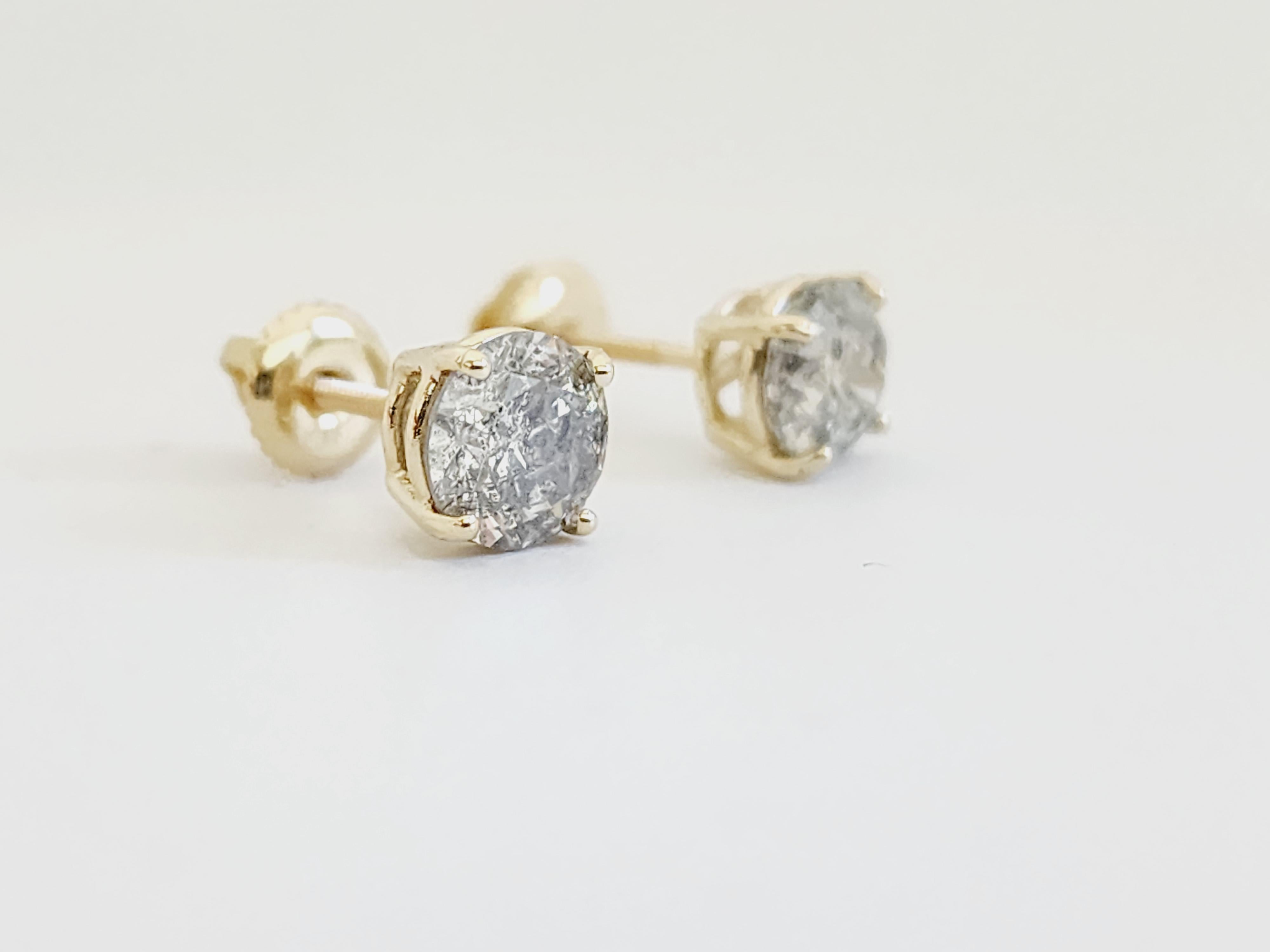 Beatiful Set of Natural Round Diamond Studs set in 4 Prong Screw Back 14k Yellow gold 

Total Carats: 2.03
Color range: I-J
Clarity: VS1