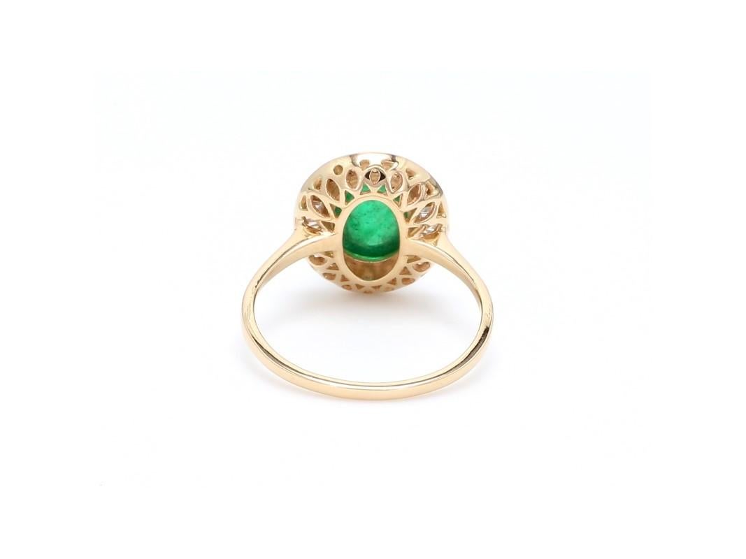 A Beautiful Handcrafted Ring in 18 Karat Yellow Gold  with Natural Emerald in Oval cabochon and Diamonds double Halo . A perfect Ring for occasion

 Emerald Details
Pieces : 1 Pieces Square Cut 
Weight : 2.03 Carat 
AA Quality Emerald

Natural