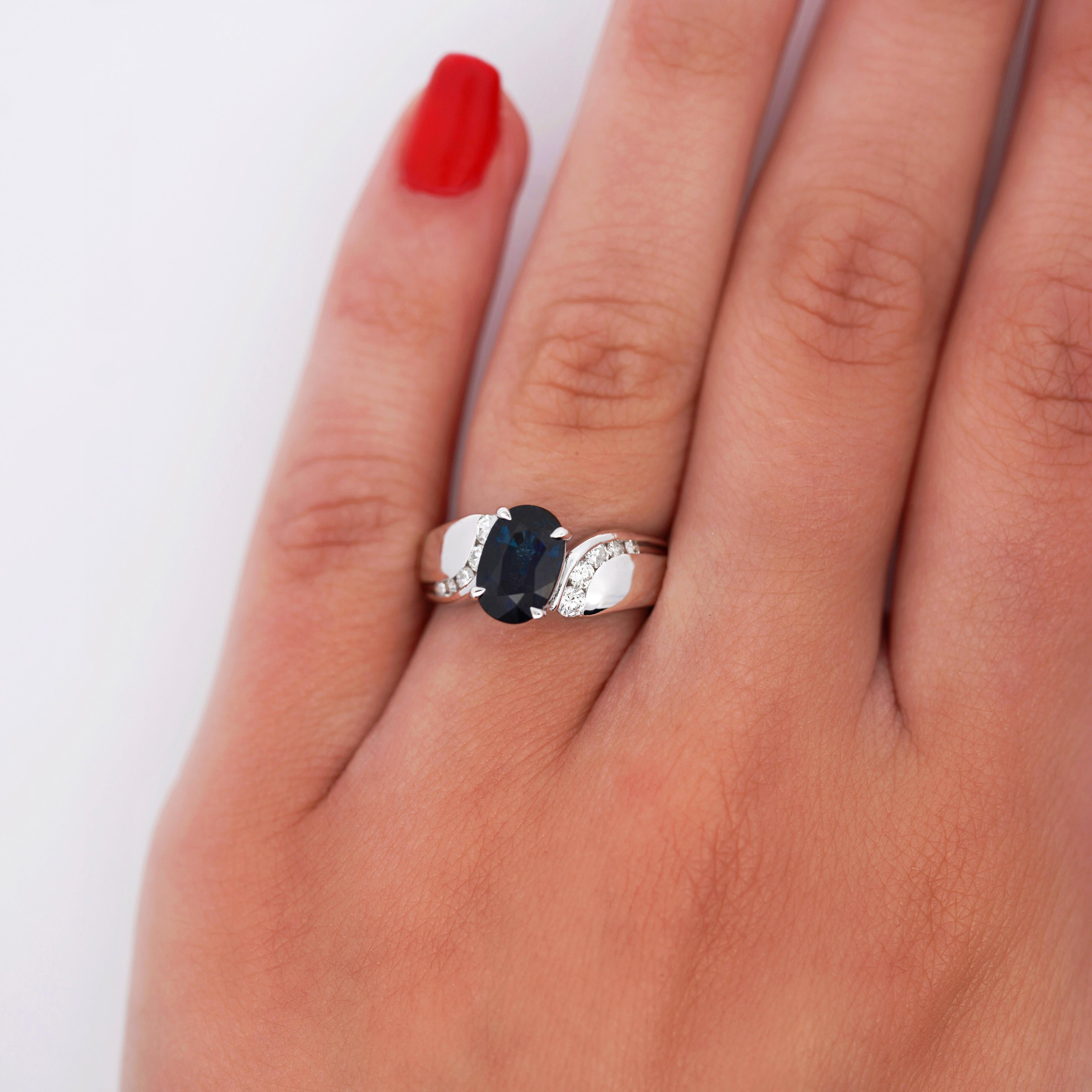 2.03 Carat Oval Cut Sapphire with Diamond Accent Bypass Platinum Ring In New Condition For Sale In Miami, FL