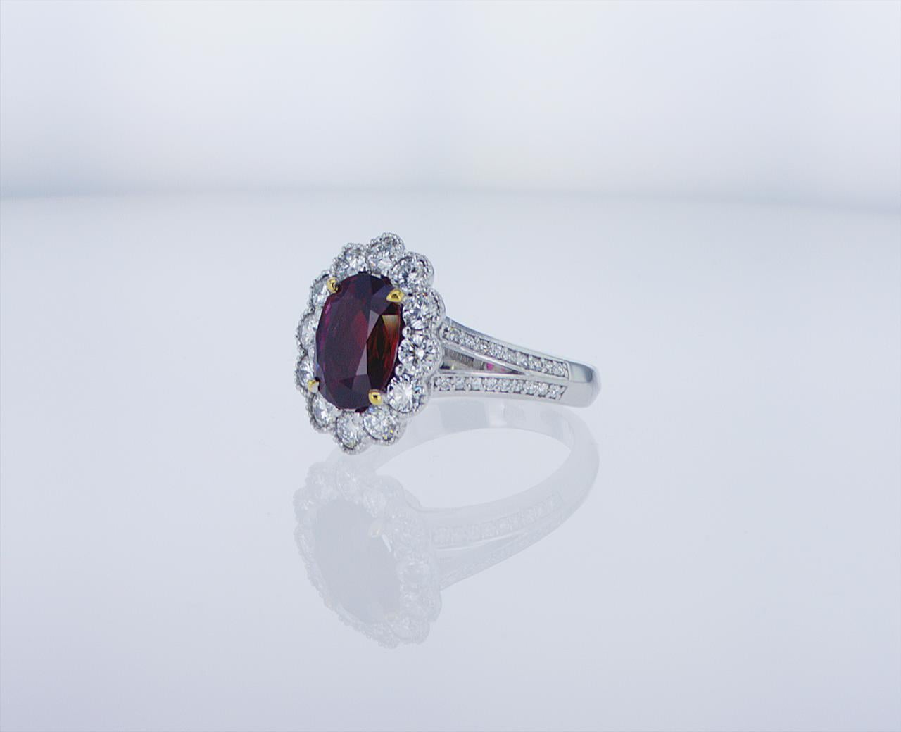Oval Cut 2.03 Carat Oval Thai Ruby Ring W/1.08 Carat TW of Diamonds in 18k WG W/Palladium For Sale