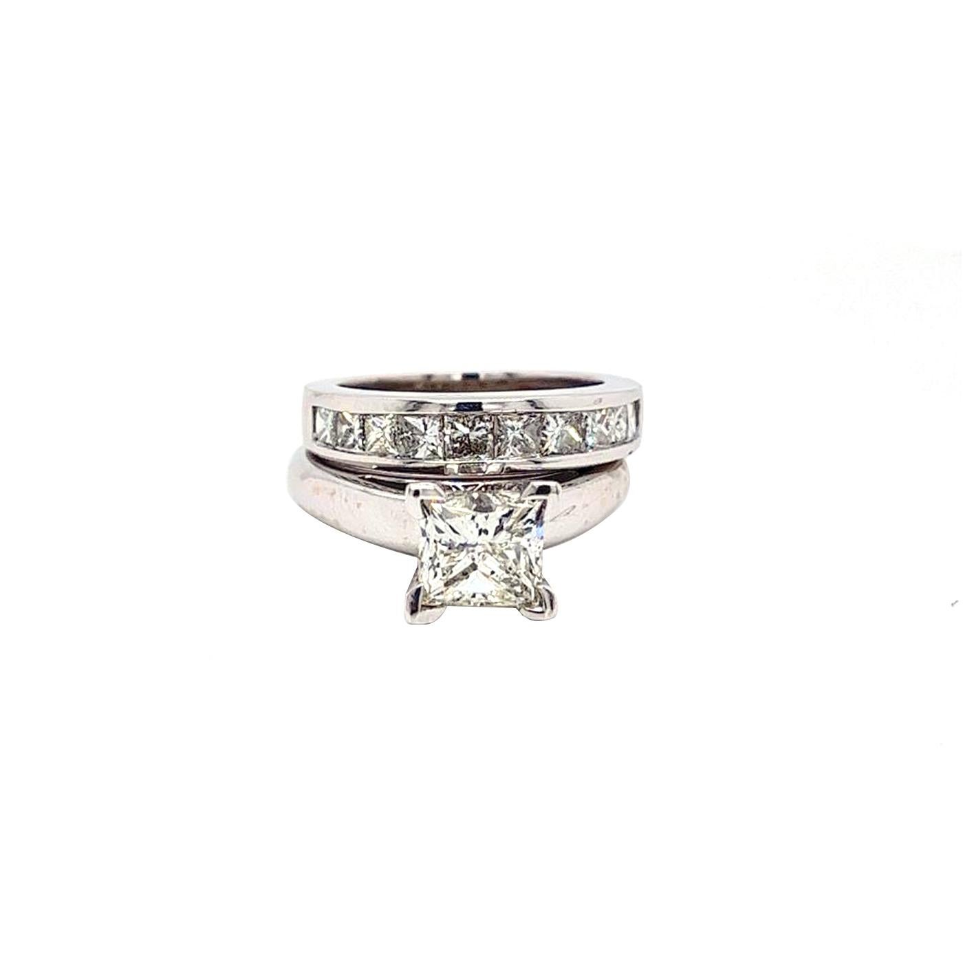 This Uniquely Designed Solitaire Engagement Ring Is Simply Beautiful Features 14 Karat White Gold, The Diamond Is Appraised by Gia Appraiser, It Has 2.03 Ct Princess Cut Diamond of H Color and Si1 Clarity. To Emphasize the Diamond Truly Fire and
