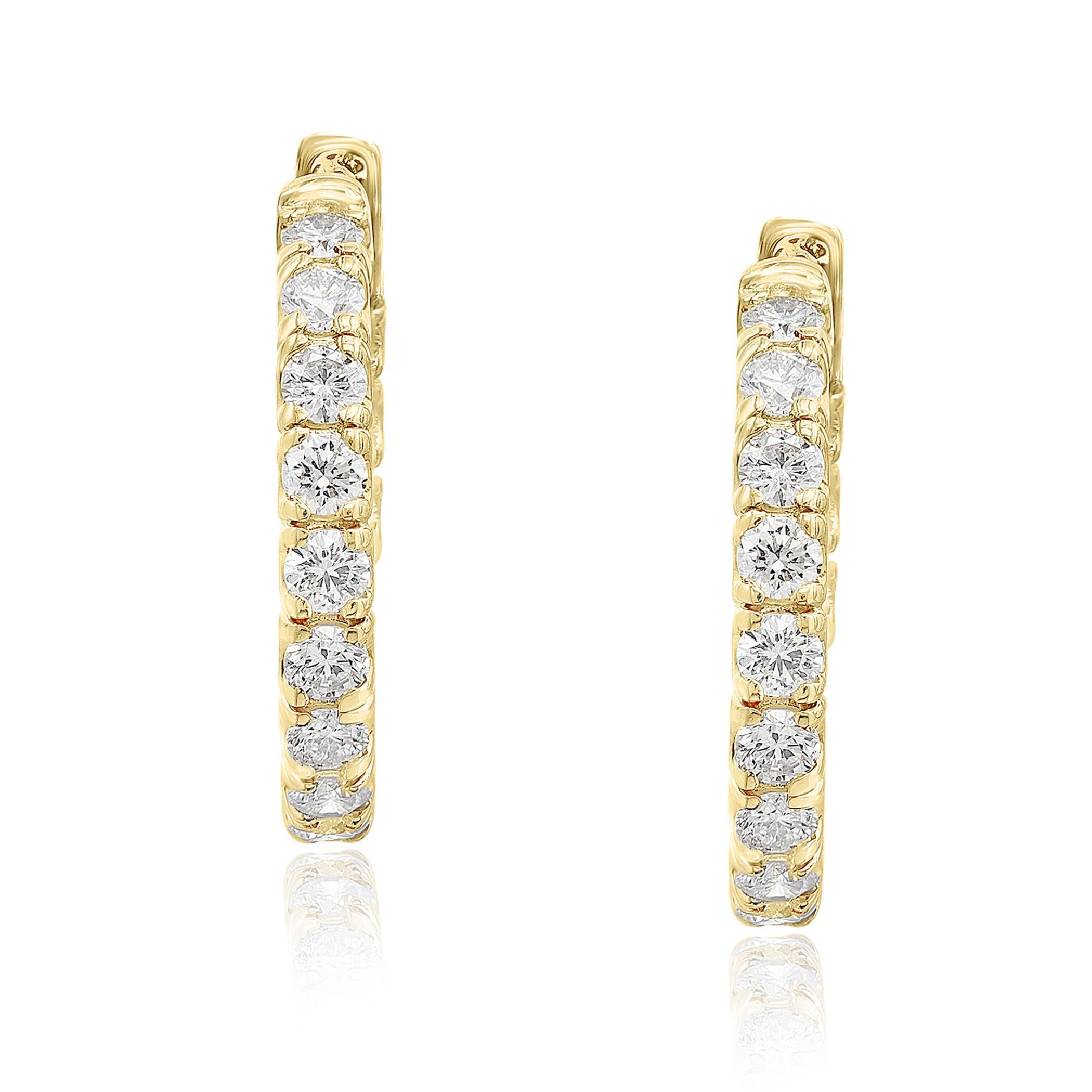 A chic and fashionable pair of hoop earrings showcasing round diamonds, set in 14k yellow gold.  30 Round diamonds weigh 2.03 carats total. A beautiful piece of jewelry.
All diamonds are GH color SI1 Clarity.
Style is available in different price