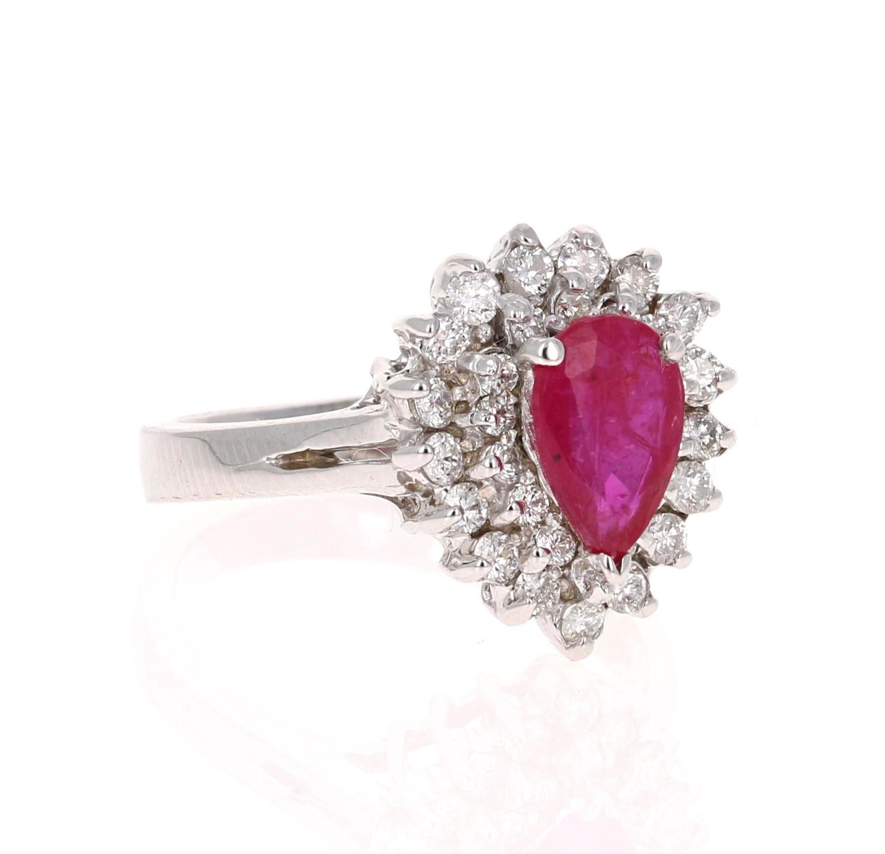 A simple yet beautiful ring with a 1.38 Carat Pear Cut Ruby as its center and 32 Round Cut Diamonds that weigh 0.65 carats. (Clarity: SI, Color: F) The total carat weight of the ring is 2.03 carats.

The origins of the Ruby are from Mozambique,