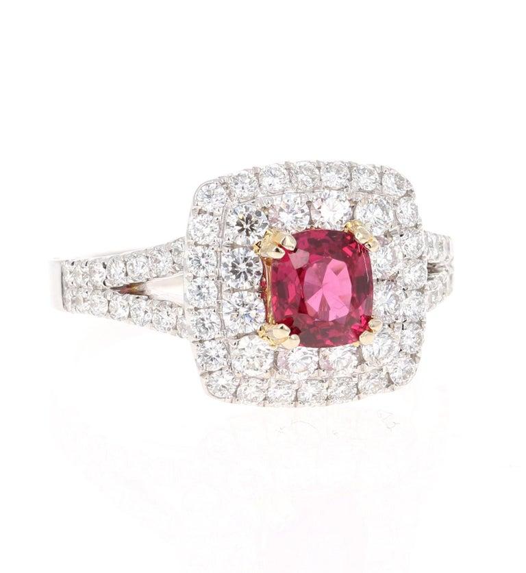 This beautiful ring has all the characteristics to be a stunning Engagement/Bridal Ring! 

The magnificent Cushion Cut Spinel weighs 0.91 Carats and measures at 6 mm x 5 mm.  Surrounding the Spinel are 64 Round Cut Diamonds that weigh 1.12 Carats.