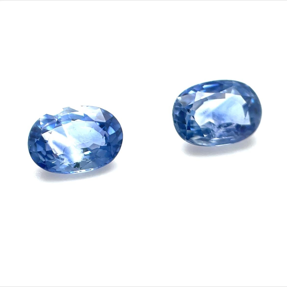 This pair of bright, powder blue sapphires will make such pretty earrings! Weighing over 2 carats total, these clean, nicely shaped ovals will look nice on their own as studs, or set with accent diamonds or other colored gems! Their lighter color is