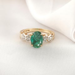 2.03 Carat Zambian Emerald 0.11 Carat SI/H Diamond Ring 18 Karat Yellow Gold