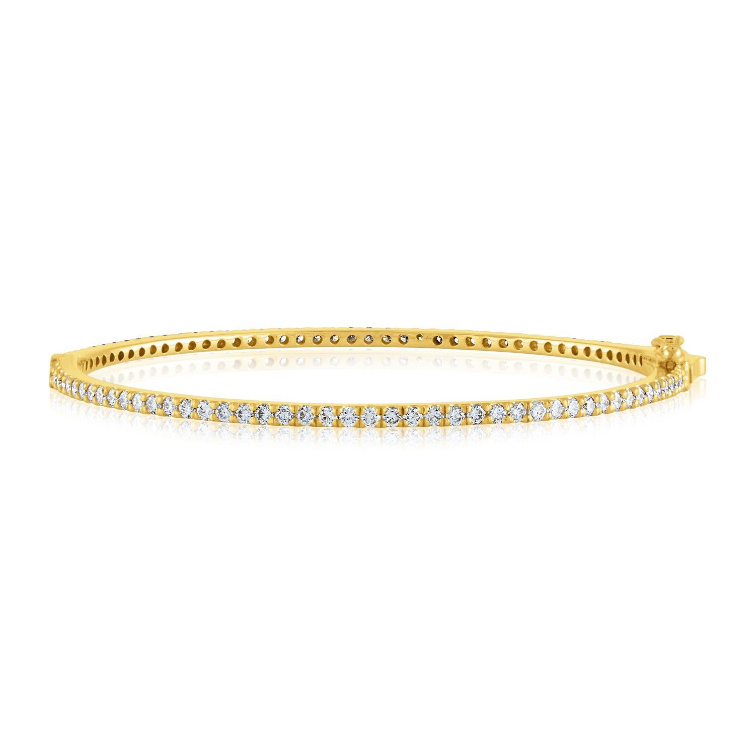 All around Diamond Gold Bangle Bracelet
The bracelet is 14K Rose Gold and Yellow Gold
There is 2.03 Carats in Diamonds F/G VS/SI
Fits up to 6.50 inch wrist.
The bracelet weighs 8.7 grams
Available in rose gold  or yellow gold
Please specify Gold