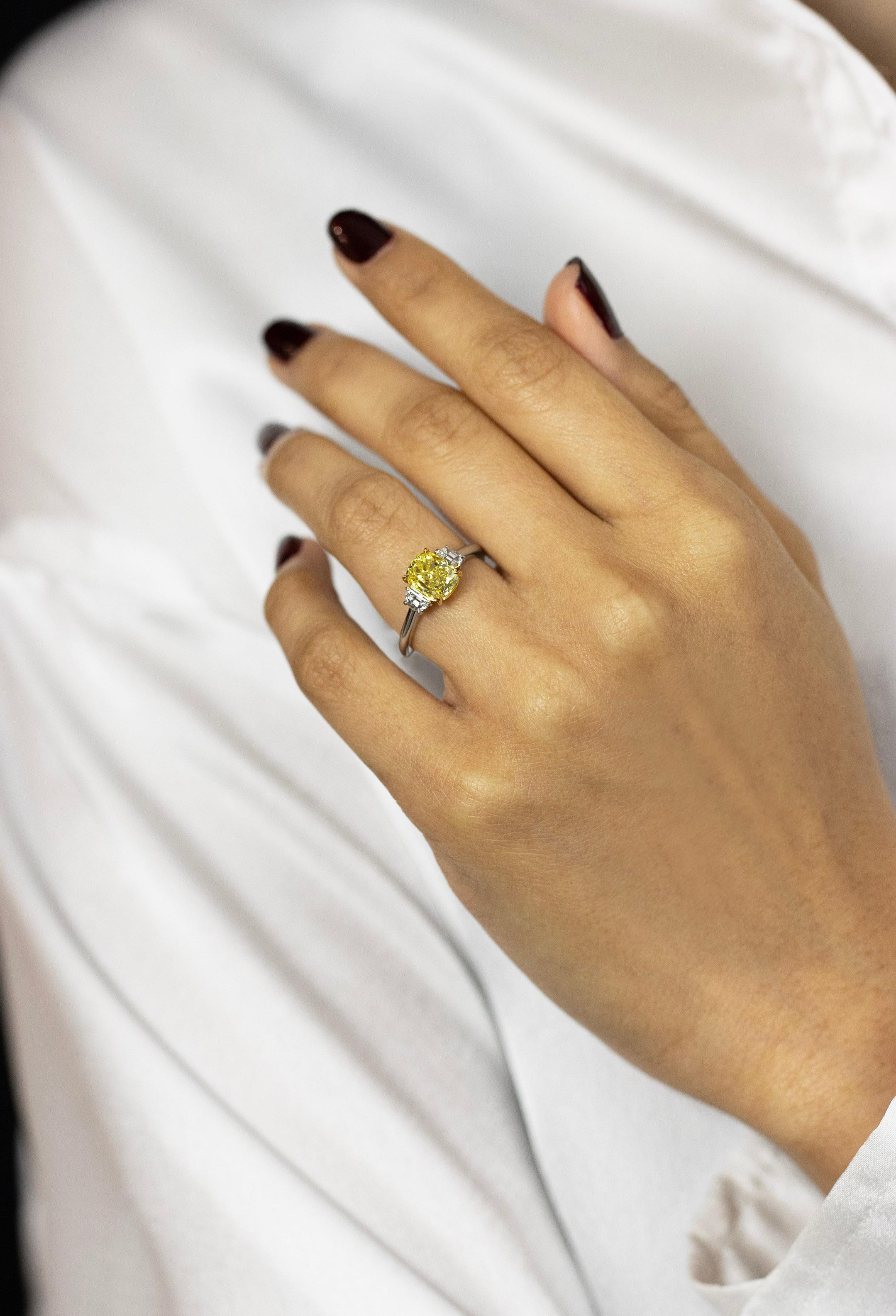Cushion Cut 2.03 Carats Fancy Intense Yellow Diamond Three-Stone Engagement Ring For Sale
