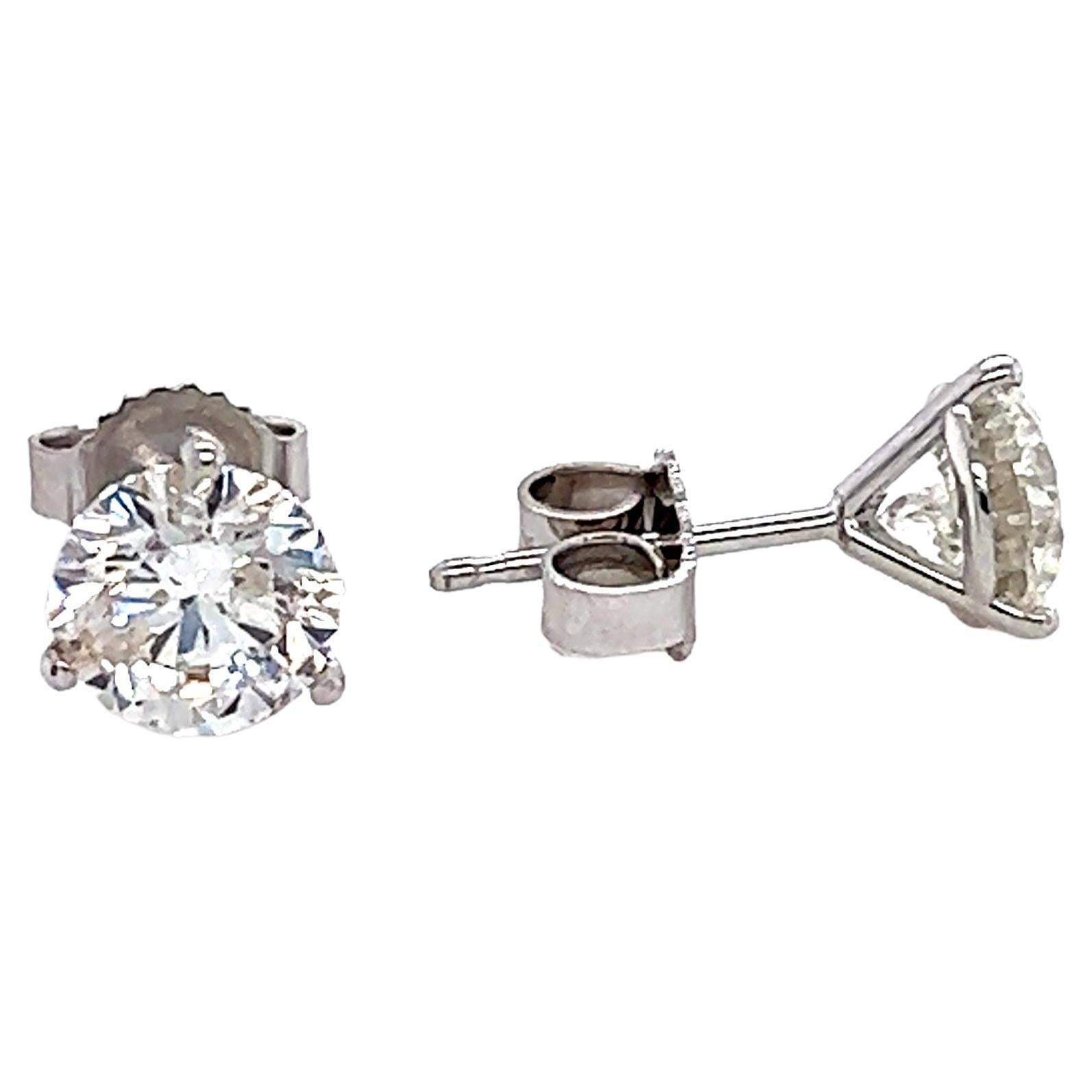 2.03 ct Round Diamond Solitaire Stud Earring in 14k White Gold

These round diamond solitaire stud earrings are crafted in lustrous 14-karat white gold and feature round-cut, prong-set in a classic solitaire stud design. With exquisite luster and