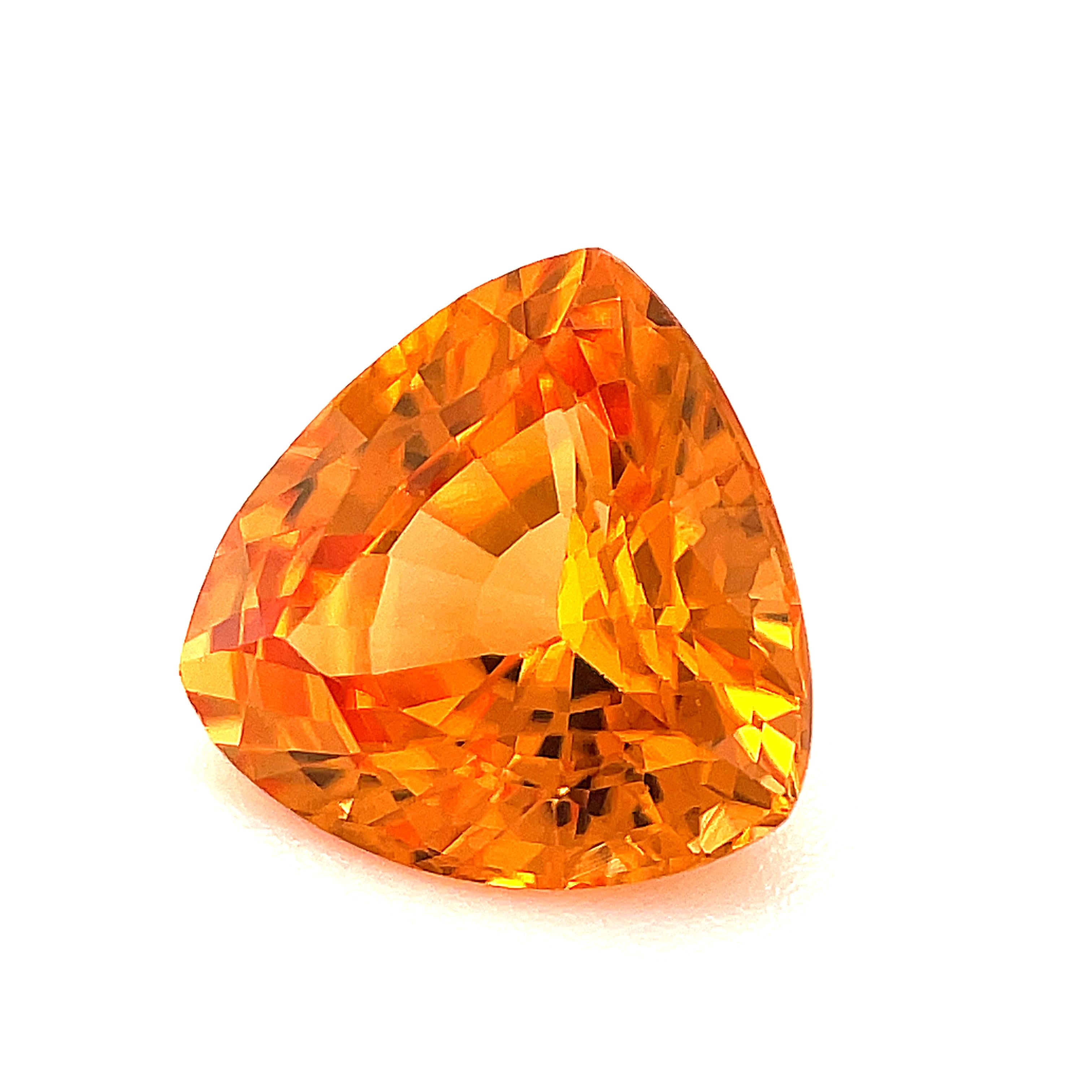 This trillion shaped spessartite garnet has a beautiful orange color and is extremely lively! Measuring 7.73 x 7.52 x 7.51 millimeters (measured in the way the height of a triangle is measured in geometry), with a depth of 4.52 millimeters, this is