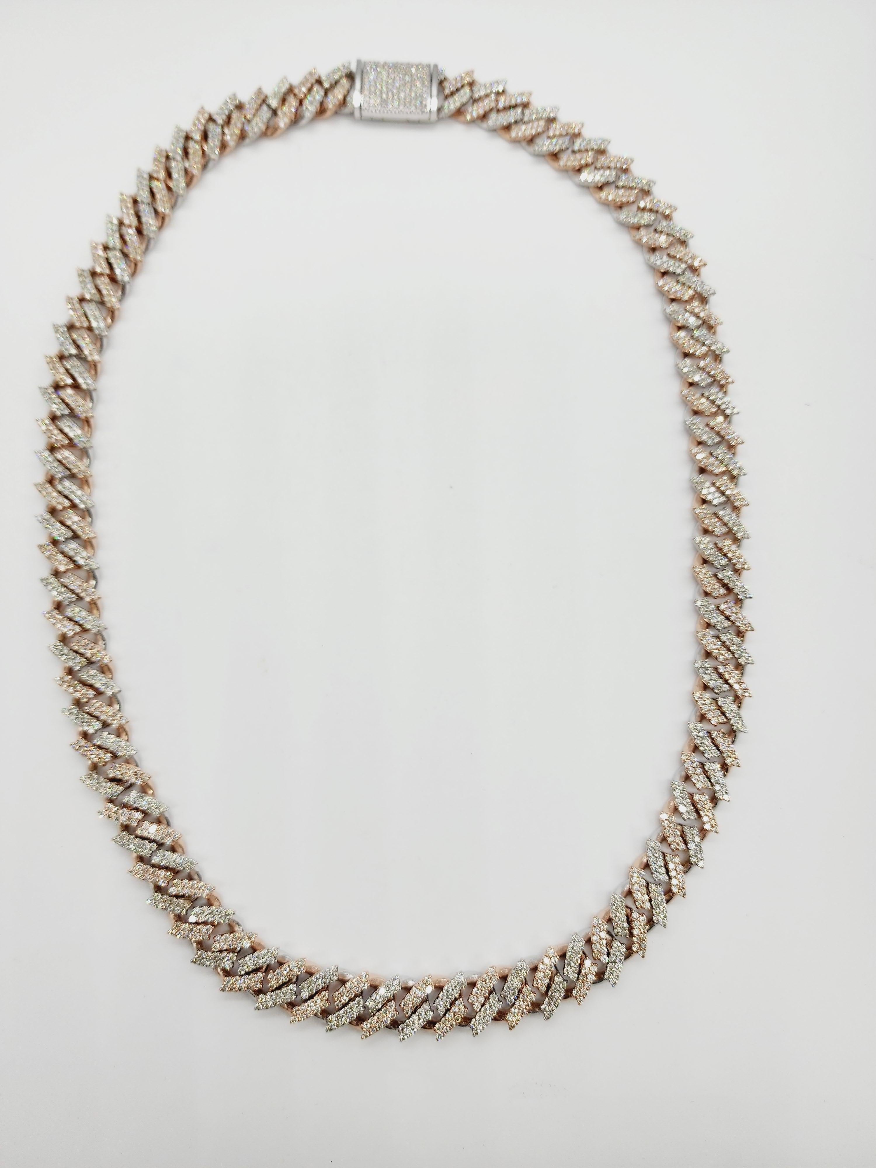 20.30 Carats Total Weight Heavy Gold Cuban Necklace Chain 14 Karats Rose Gold
Two Tone Rose and White Gold 
20 inch , 12 mm wide, Average Color I, Clarity SI, Natural Diamonds. 