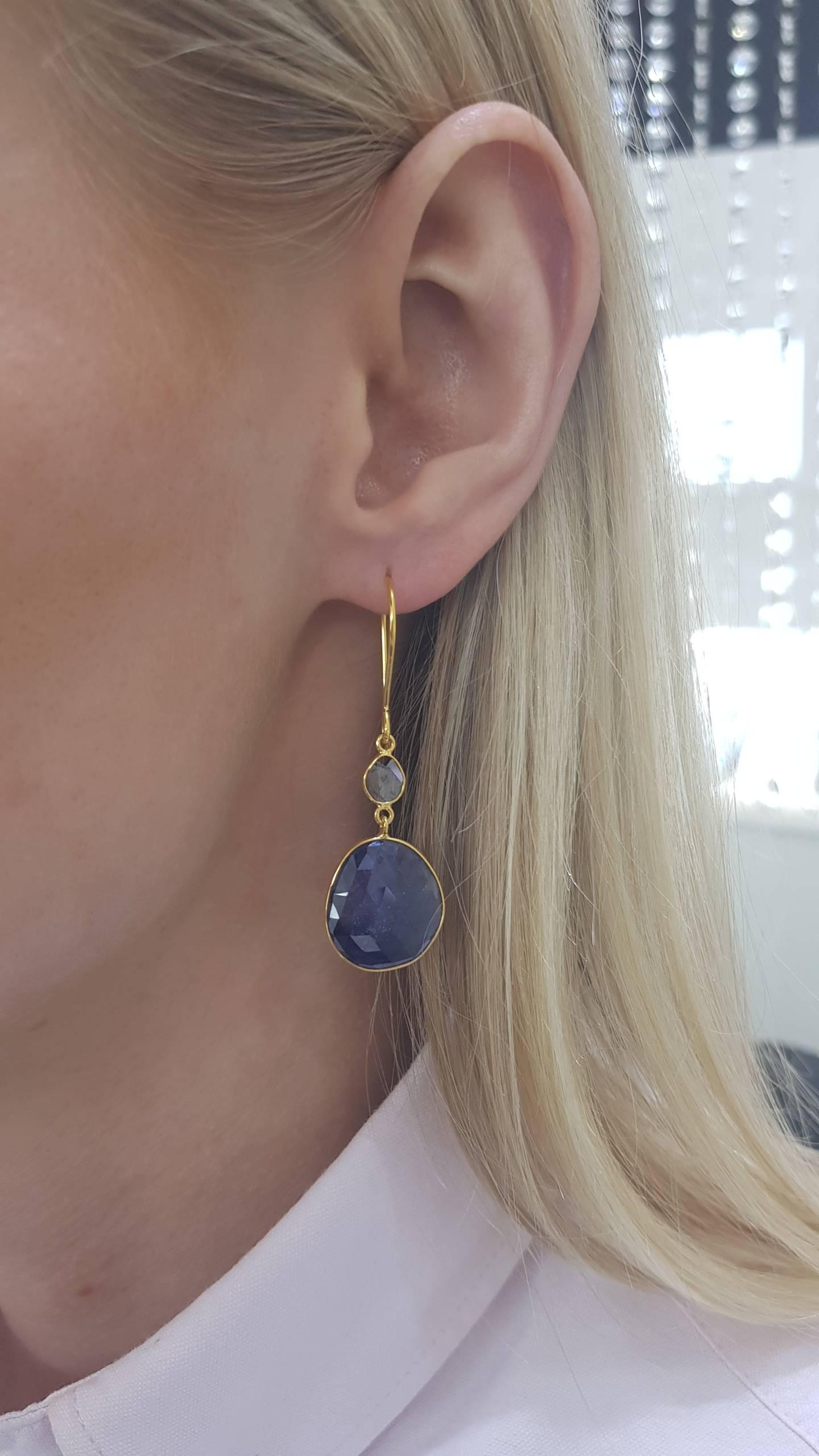 These Gorgeous 20.00 Carats Rose Cut Blue Sapphire Earrings from the Artisan Collection made by Tresor Paris featuring 0.30 Carat in two Diamond slices set in 18 Karat Yellow Gold. Each piece is hand made with a unique shaped precious stones. These