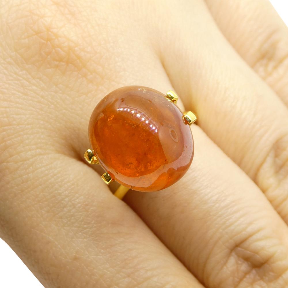 Description:

Gem Type: Spessartine Garnet
Number of Stones: 1
Weight: 20.32 cts
Measurements: 15.34 x 13.43 x 9.49 mm
Shape: Oval Cabochon
Cutting Style Crown:
Cutting Style Pavilion:
Transparency: Semi-Transparent
Clarity: Moderately Included: