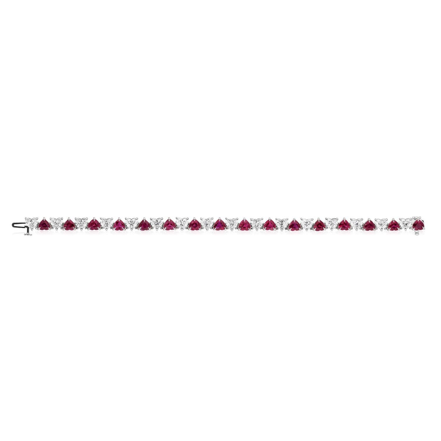 Gorgeous and Unique Ruby and Diamond Bracelet.
16 Heart Shaped Rubies weighing 10.20 Carats.
16 Heart Shaped Diamonds weighing 8.15 Carats.

Set in Platinum.
Measures 6.75 inches.