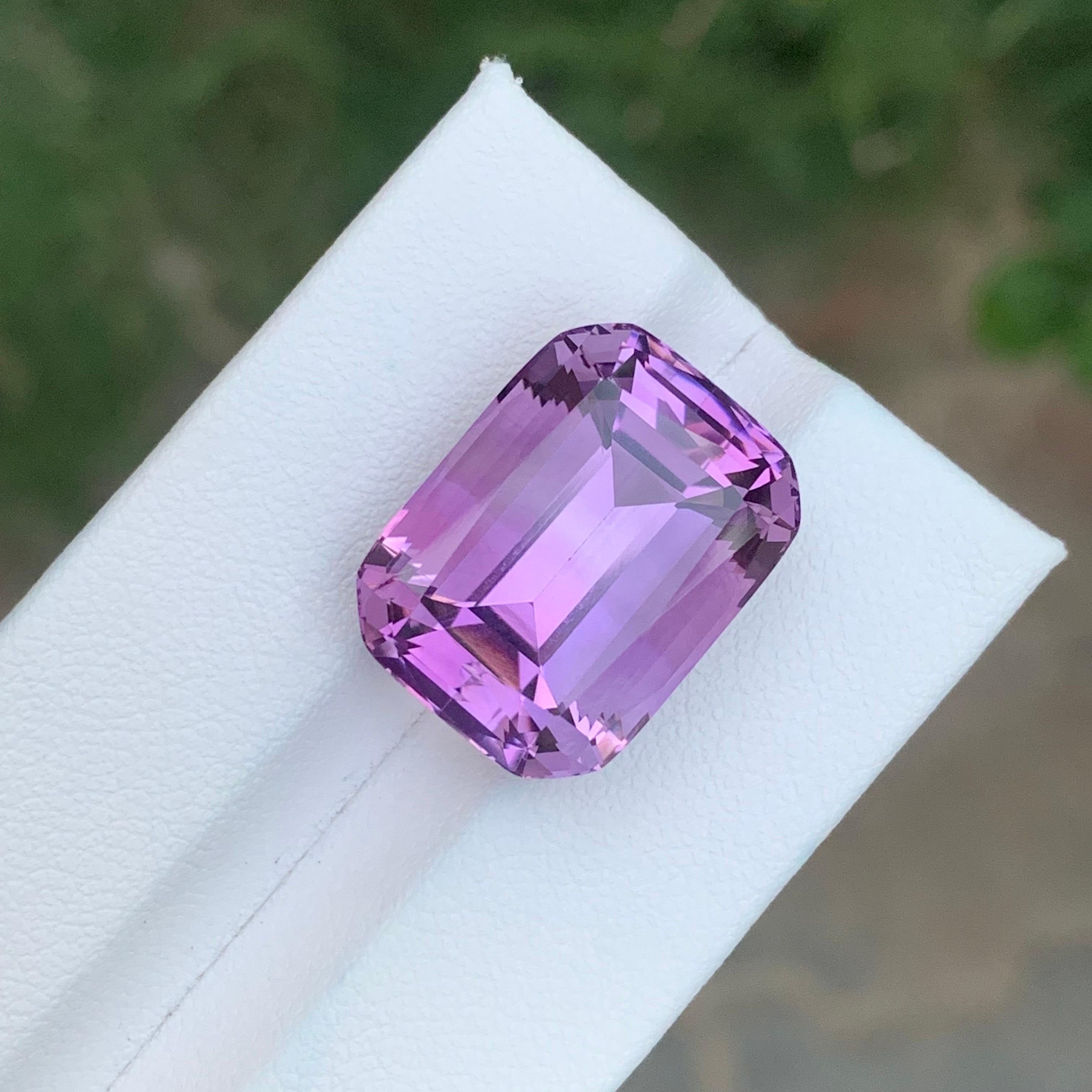 Stone: Amethyst

Weight : 20.35 Carats
Dimension: 18.4 x 13.9 x 11.4 Mm
Origin: Brazil
Shape: Emerald 
Color: Purple
Treatment: Non
Certificate: On Customer Demand

Amethyst, a stunning violet variety of quartz, is known not only for its beauty but