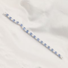 Bracciale tennis con zaffiro blu ovale da 20,35 carati e diamanti naturali, in oro bianco 18 carati