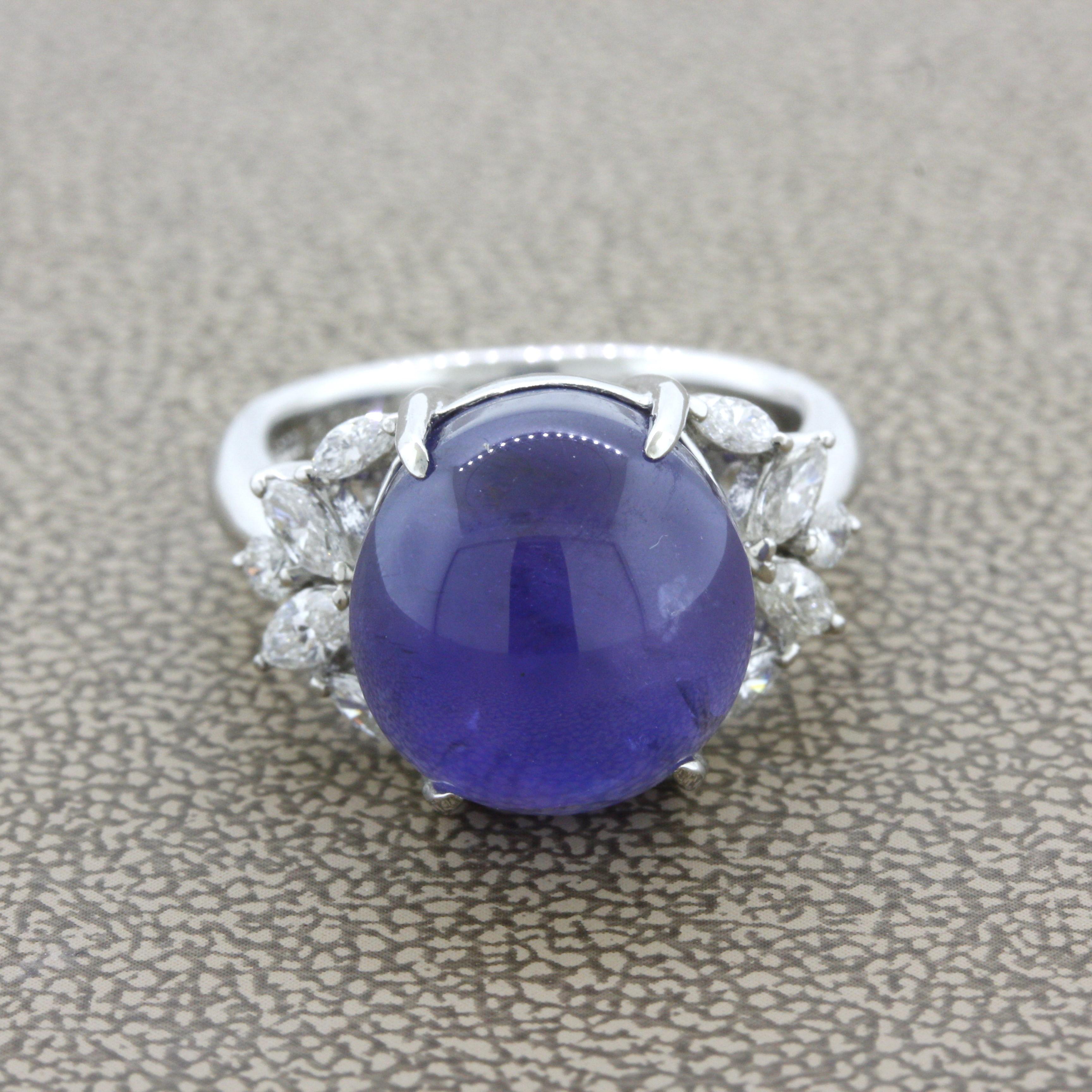 A unique and special gem! It is a large 20.38 carat star sapphire which also has color change, two unique phenomena!  The sapphire has a violitish-blue color that changes to a stronger purple color. Adding to that when a light hits the top of the