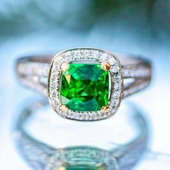 2.04 Carat Certified Transparent Green Tsavorite 
0.27ct Diamond 18 Karat Ring