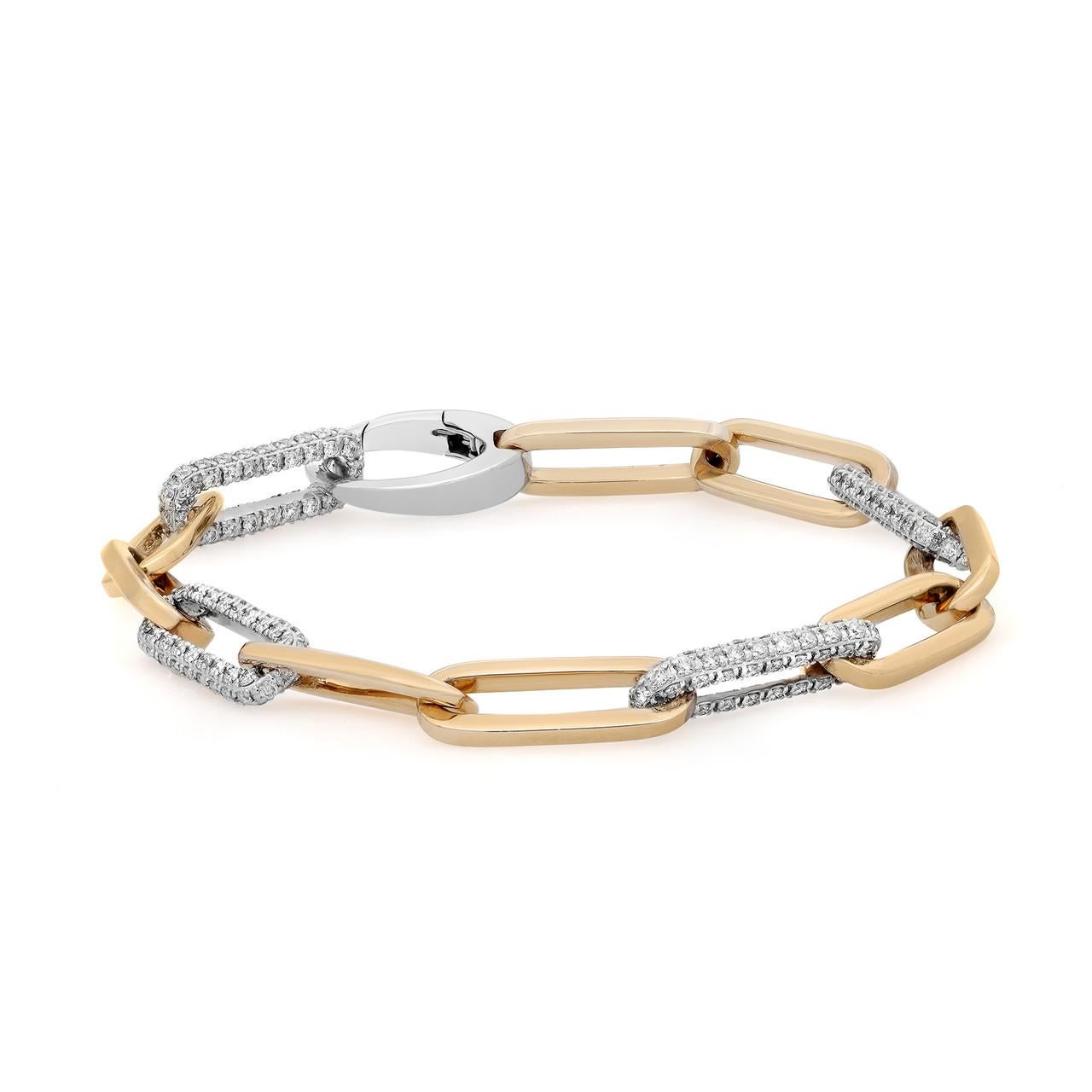 Introducing the sleek and modern paperclip-link bracelet, a sophisticated piece crafted from 14K white and yellow gold. This exquisite bracelet is adorned with shimmering pavé white diamonds, totaling 2.04 carats. The combination of the two-tone