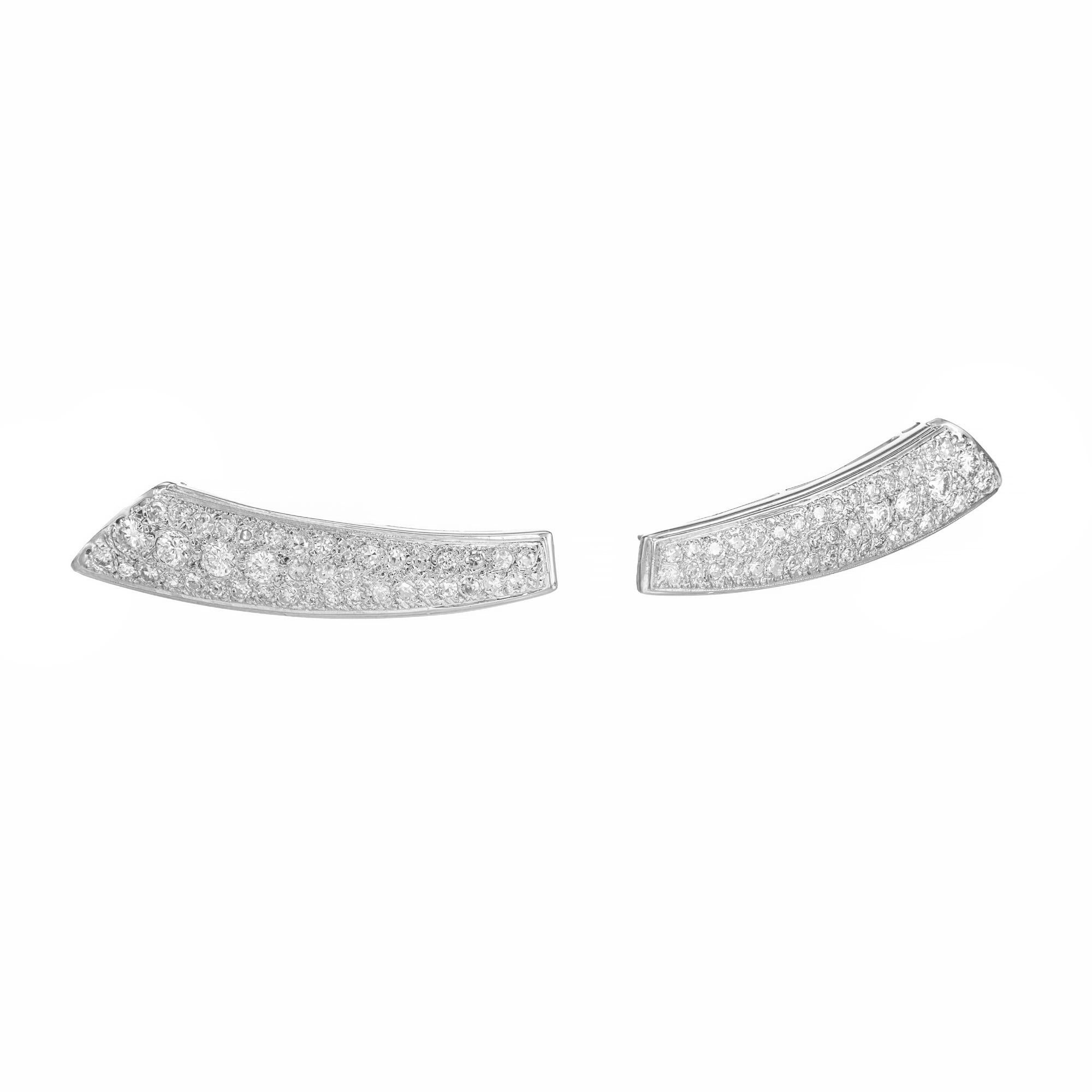 Crescent shaped diamond earrings. 2.04 carat micro pave round diamonds set in 14k white gold settings. Circa 1960's

8 round brilliant cut diamonds G-H SI, approx. .80ct
76 single cut diamonds G-H SI, approx. 1.00cts
14k white gold 
8.1 grams
Top to