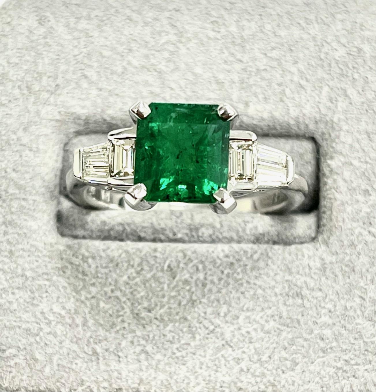 2.04 Carat Square cut Zambian emerald set in 18k white gold ring along with baguette and tapered bagette   diamonds 