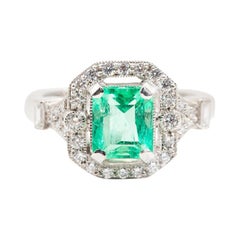 2.04 Carat Green Emerald Cut Emerald and 0.42 Carat Diamond Halo Platinum Ring