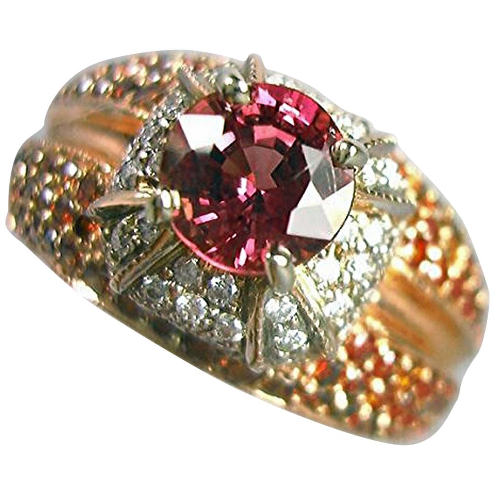 Gorgeous color Bright Orangy-Pink Padparadscha Sapphire Diamond Rose Gold Ring
Primary Stone: Sapphire Padparadscha 
Shape or Cut: Round Cut
Sapphire Weight: 1.02 Carats (1 Sapphire)
Measurements Sapphire: 5.80mmx5.80mmx3.80mm
Average Color: Bright