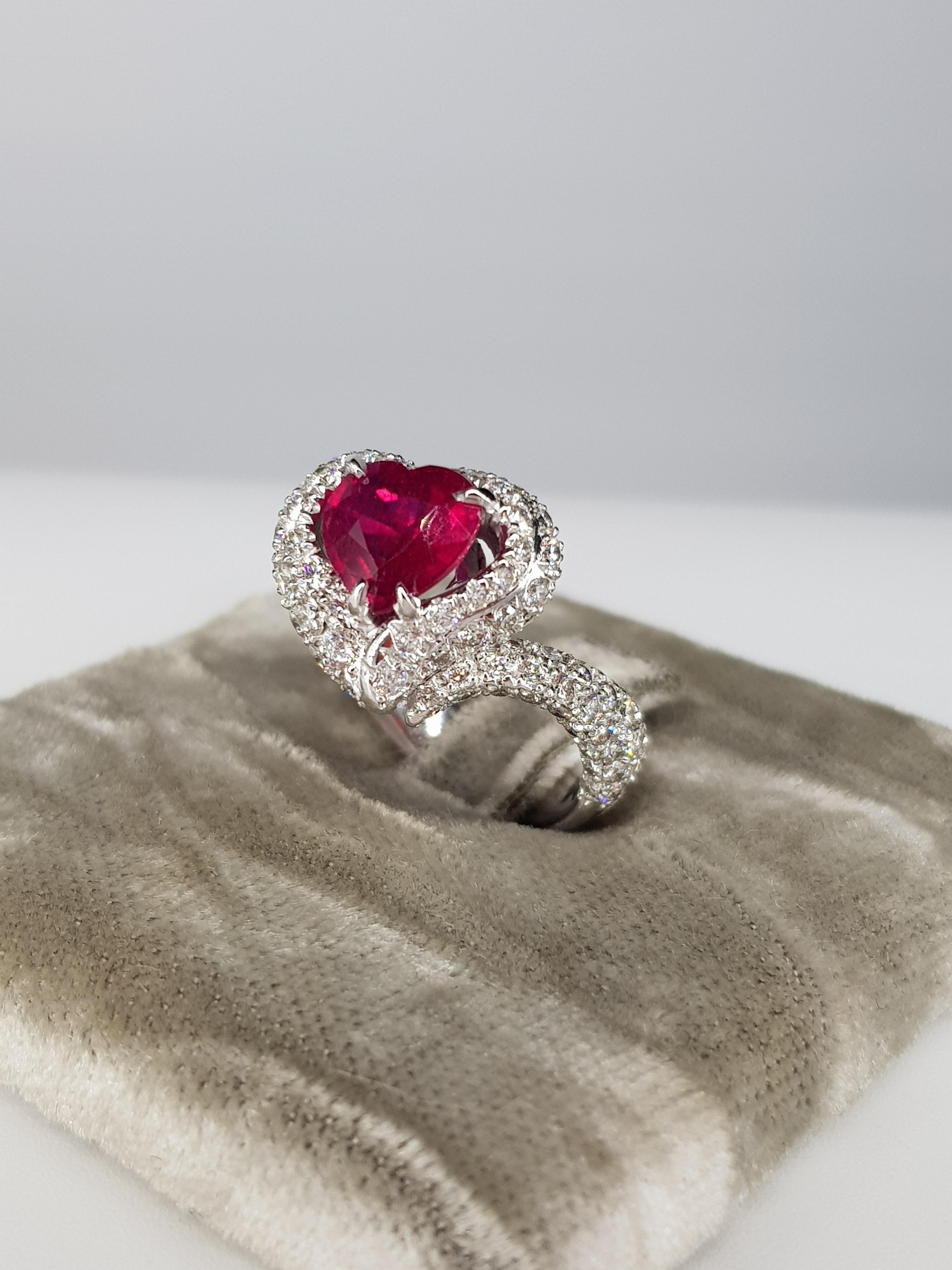 2.04 carats Heart Shaped Ruby set in 18 kt White Gold and surrounded by a pavé of 2.24 cts of White Diamonds, G Color, VVS1 Clarity
The Heart Shape Ruby is certainly the most Romantic of all stones...  for an unforgettable present !!
