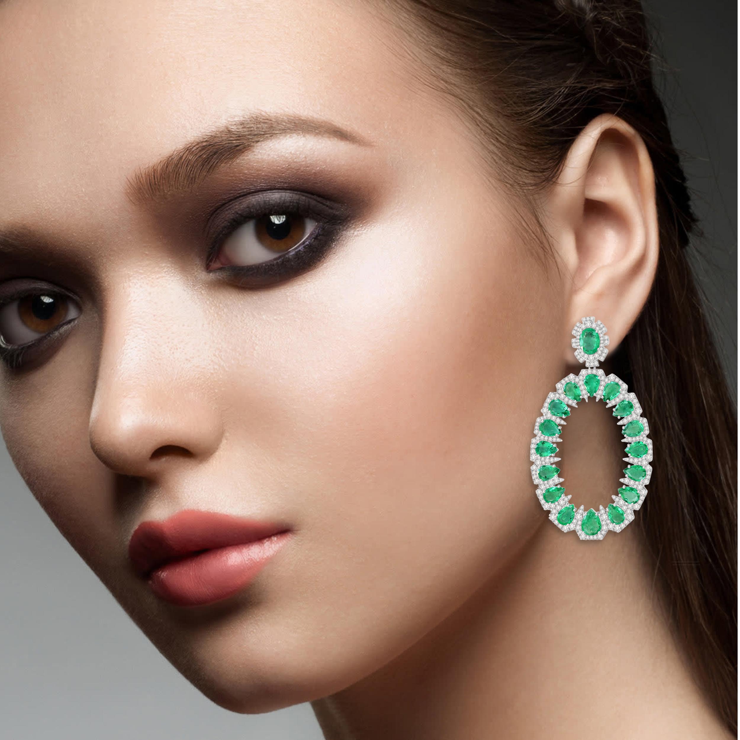 These stunning earrings are handcrafted in 14-karat gold. It is set in 20.43 carats emerald and 5.34 carats of sparkling diamonds.

FOLLOW MEGHNA JEWELS storefront to view the latest collection & exclusive pieces. Meghna Jewels is proudly rated as a