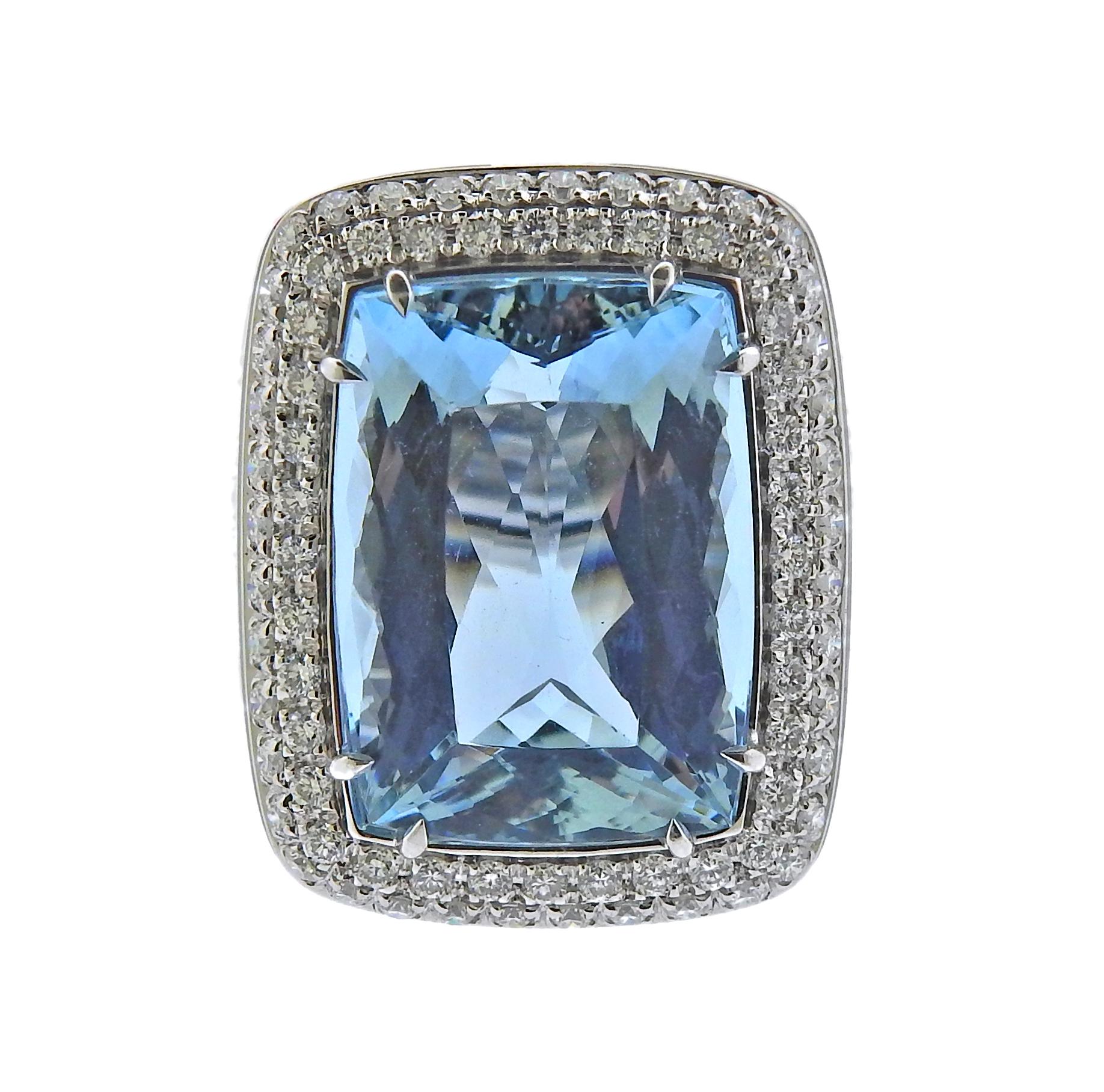 18k white gold cocktail ring, with an EGL Certified 20.47 carat aquamarine, surrounded with crystal and 2.26ctw in GH/VS diamonds. Ring size is 7.5, ring top measures - 28mm x 22mm. Weight of the ring is : 24.8 grams. Marked: 750, Italian mark,