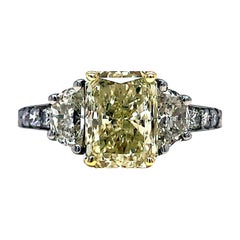 2.04ct Fancy Light yellow Radian Cut with Cadillac Three-Stone Platinum Ring