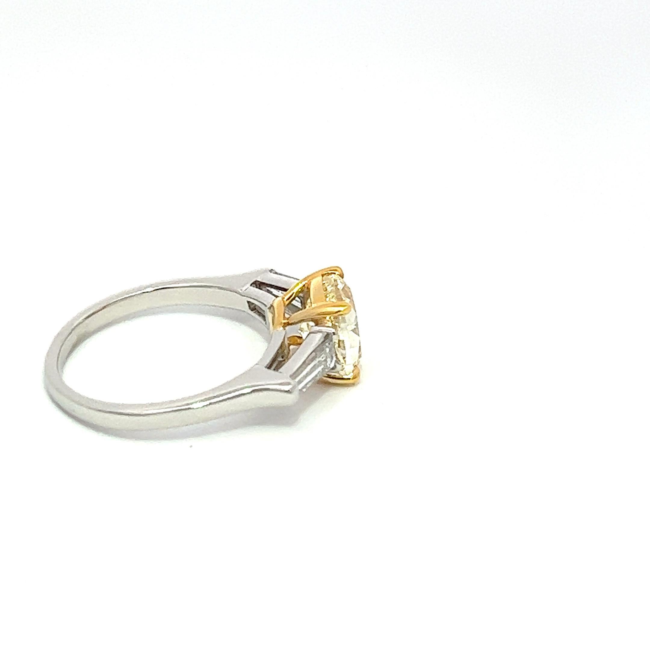 For Sale:  2.04ct Fancy Yellow Diamond with 0.50ct Baguette cut White Diamonds Ring 2