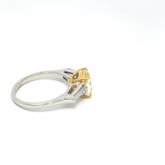 2.04ct Fancy Yellow Diamond with 0.50ct Baguette cut White Diamonds Ring