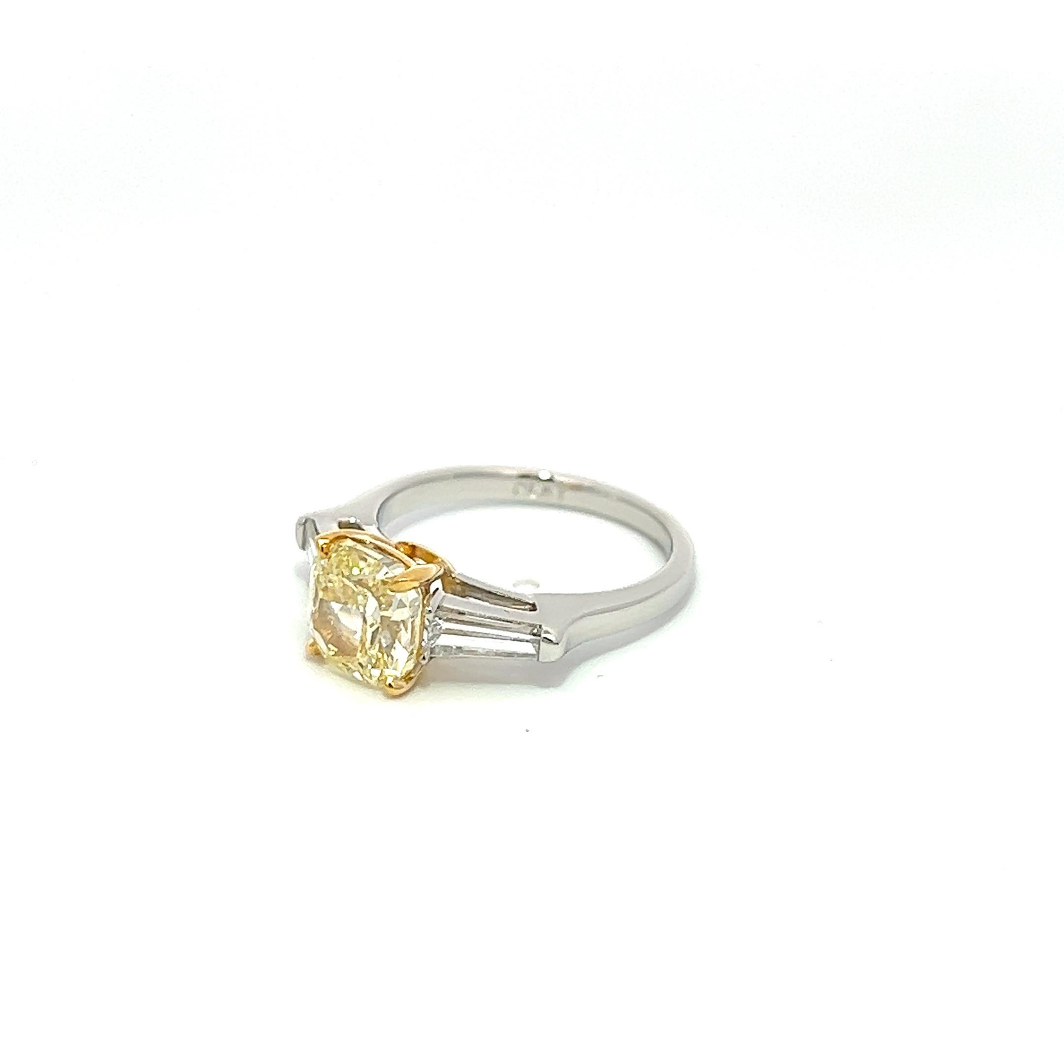 For Sale:  2.04ct Fancy Yellow Diamond with 0.50ct Baguette cut White Diamonds Ring 6