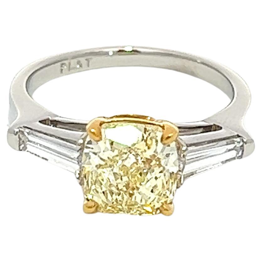 For Sale:  2.04ct Fancy Yellow Diamond with 0.50ct Baguette cut White Diamonds Ring