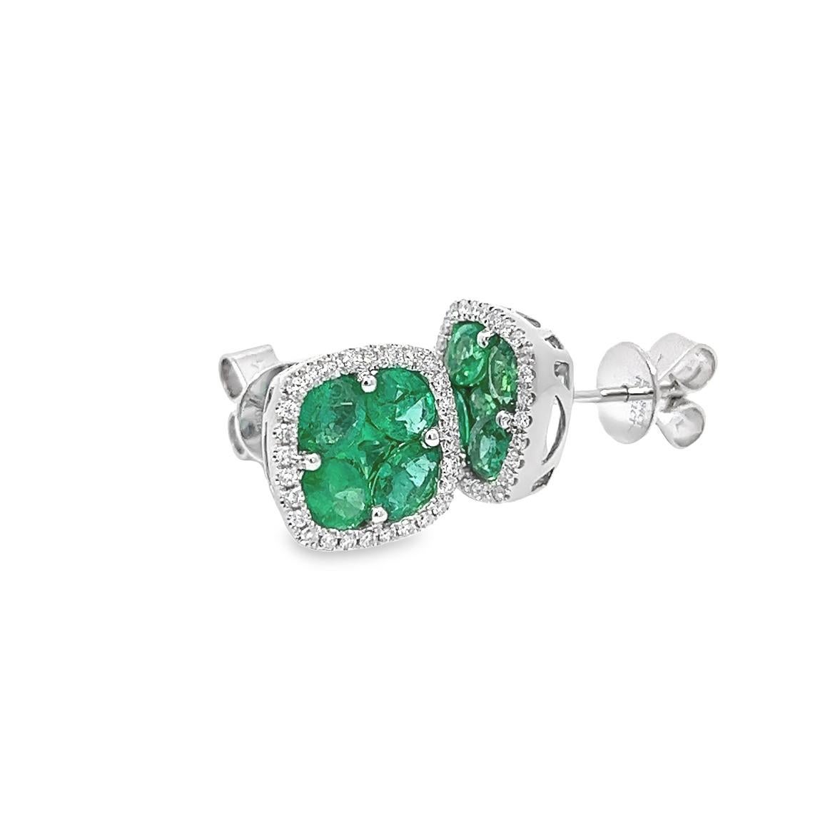 This beautiful pair of earrings are made of Natural Emeralds and a Good Quality of  Earthborn Diamonds summarizing the Emeralds beauty, set in polished 18K White Gold setting making this pieces an excellent accessory that can be used in a any