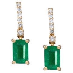 Boucles d'oreilles émeraude de 2.04cts avec accents de diamant naturel : Or massif 14k, 7x5mm