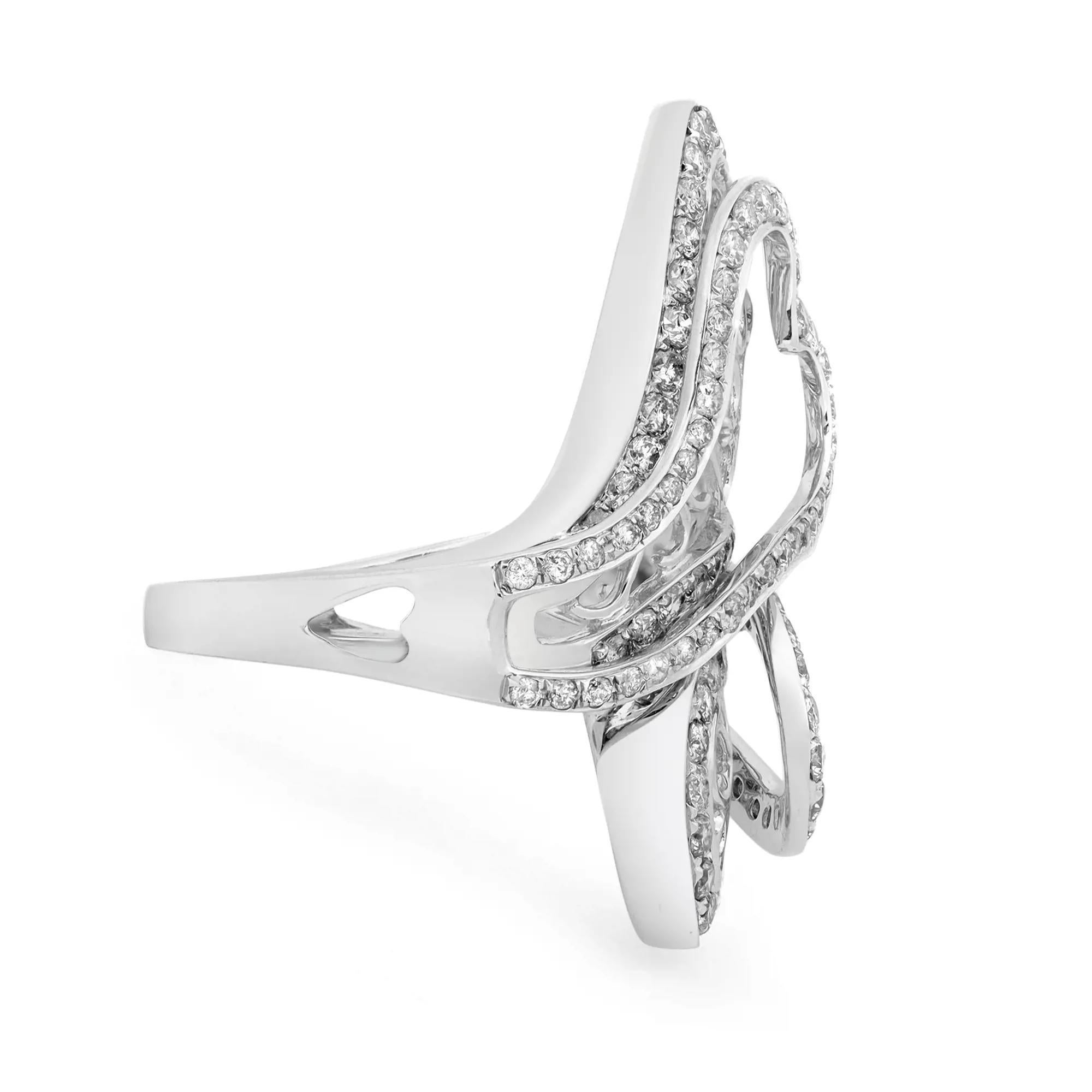Dazzle away with this bold ladies cocktail ring. Crafted in 14k white gold. Showcasing pave set round brilliant cut diamonds with intricate filigree design weighing 2.04 carats. Diamond quality: G-H color and SI1 clarity. Ring size: 7.5. Total